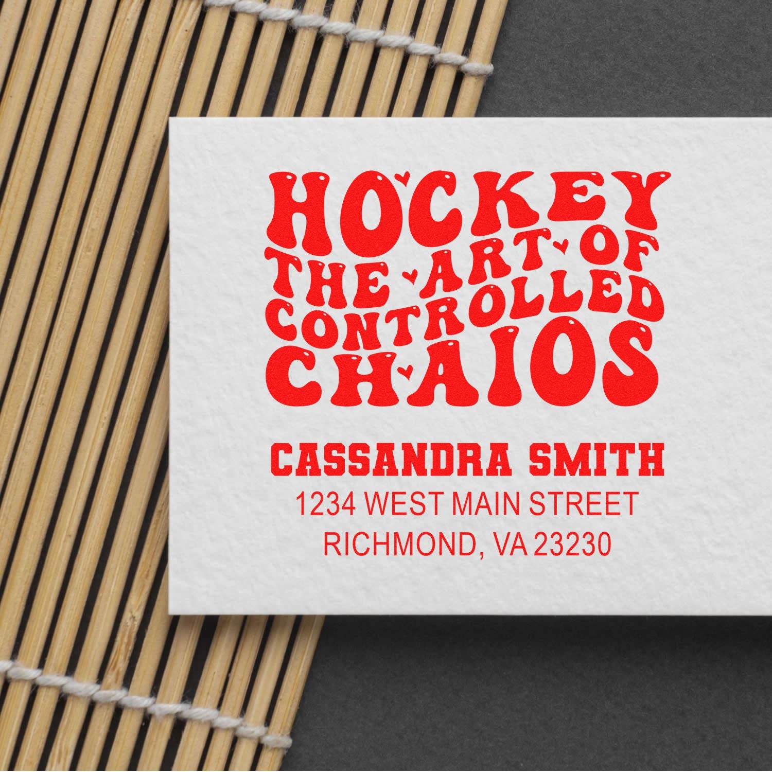 Custom hockey-themed return address rubber stamp with The Art of Controlled Chaos, name, and Richmond, VA address.