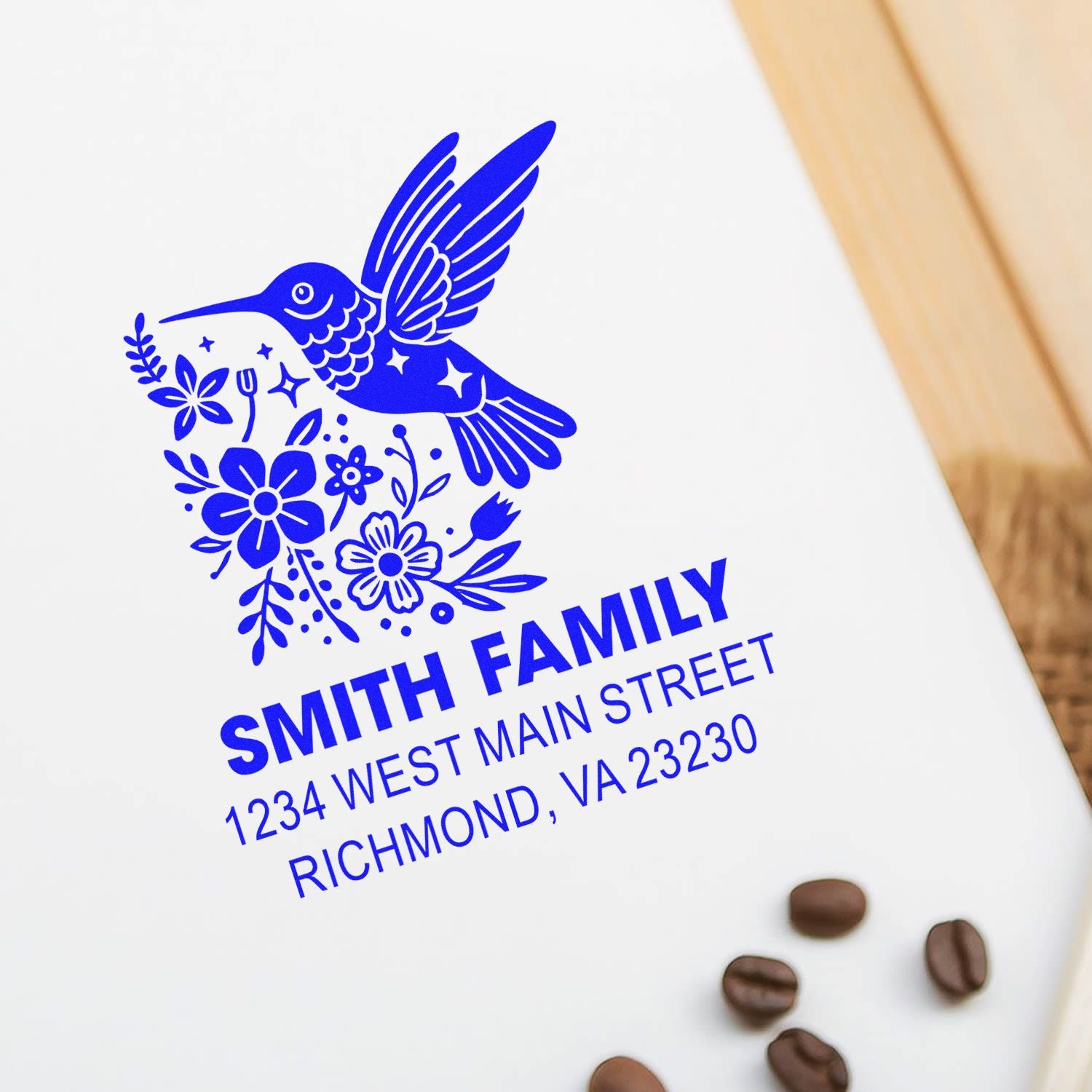 Custom hummingbird return address rubber stamp for Smith Family with floral design and Richmond, VA address.