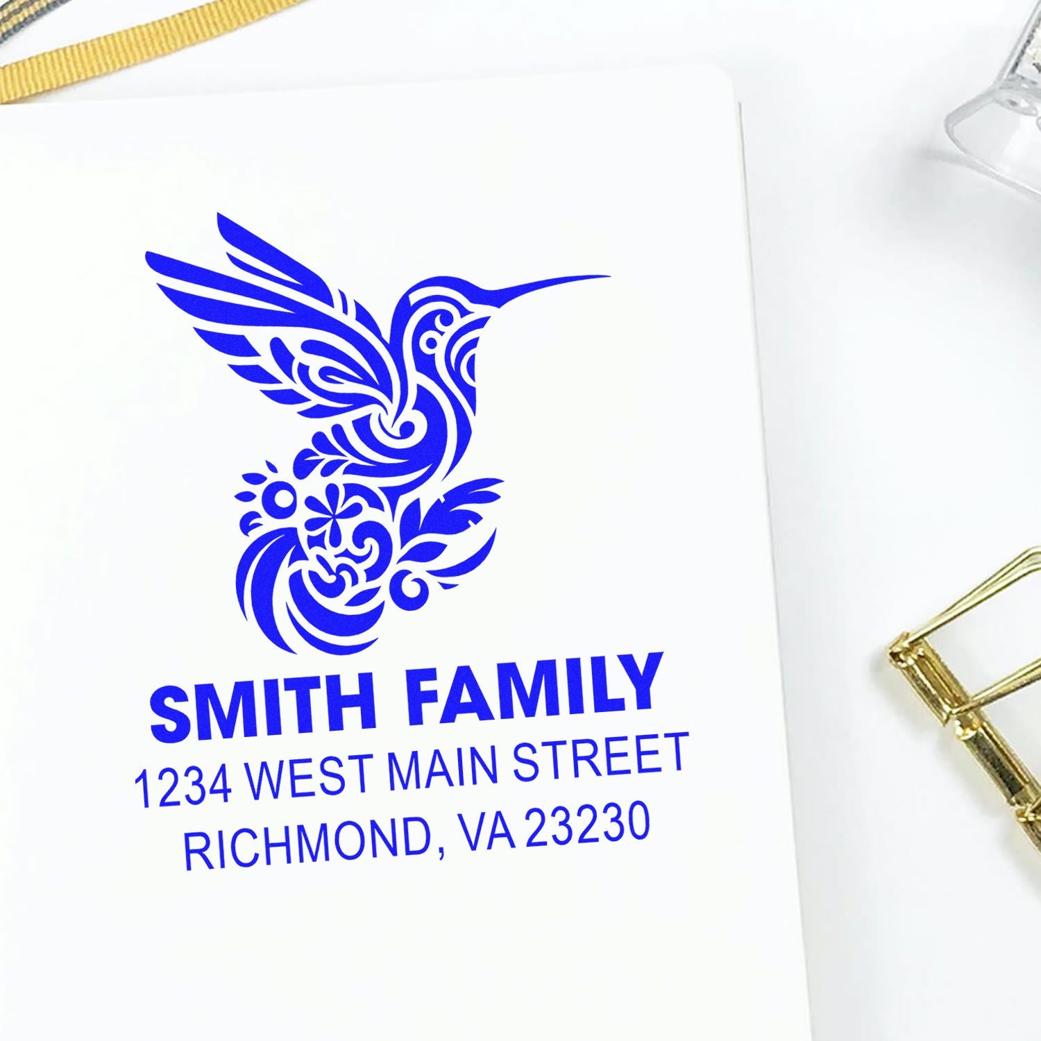 Custom rubber return address stamp with hummingbird design for Smith Family, 1234 West Main Street, Richmond, VA 23230