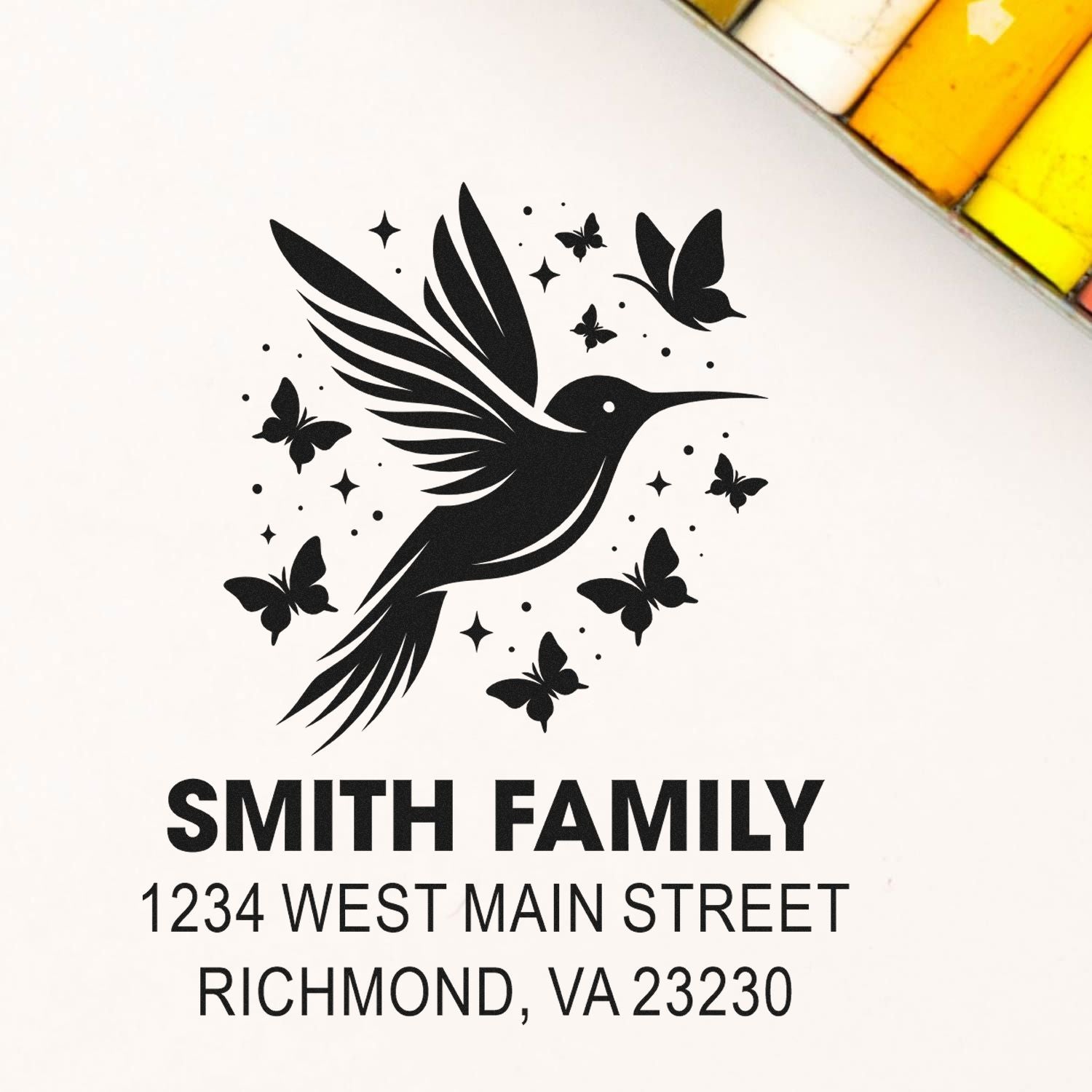 Custom family address rubber stamp with hummingbird, butterflies, and Smith family mailing address.