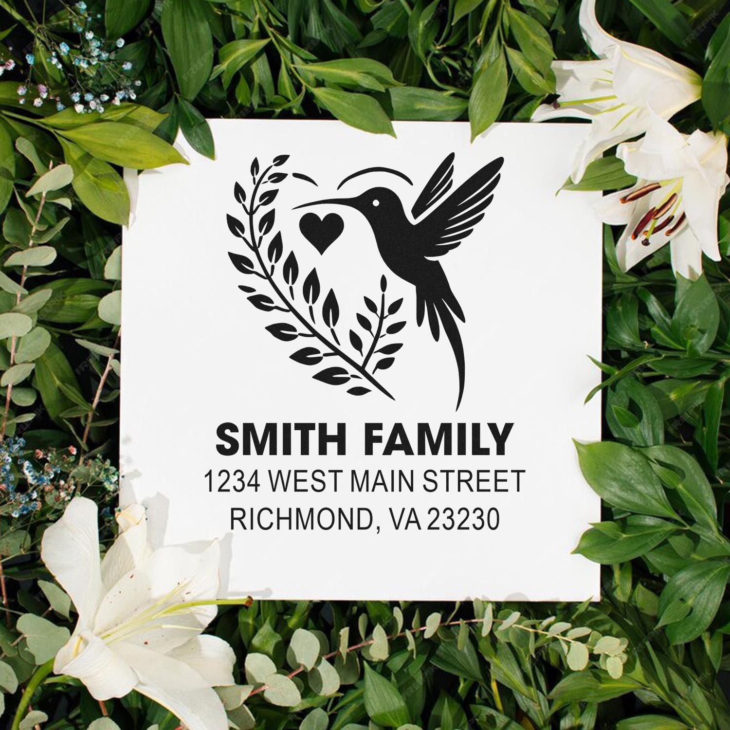 Custom rubber stamp design with hummingbird and floral wreath for Smith Family address stamp, Richmond, VA 23230.