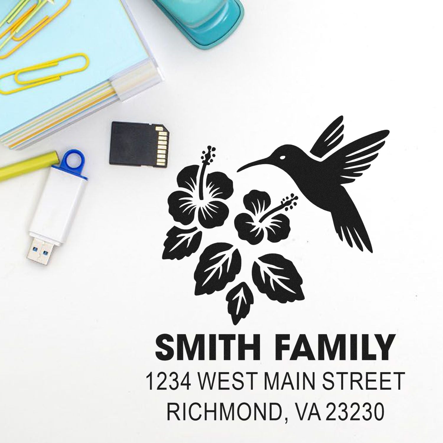 Custom return address rubber stamp with hummingbird and hibiscus design for Smith Family, Richmond, VA 23230.