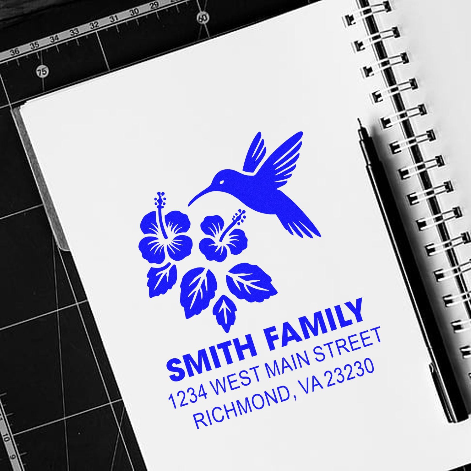 Custom family address rubber stamp with hummingbird and hibiscus design, personalized with Smith family name and Richmond, VA address.