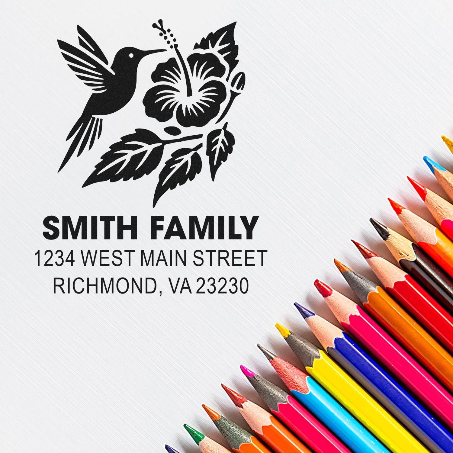 Personalized rubber stamp with hummingbird and hibiscus design for Smith Family return address, Richmond VA 23230.