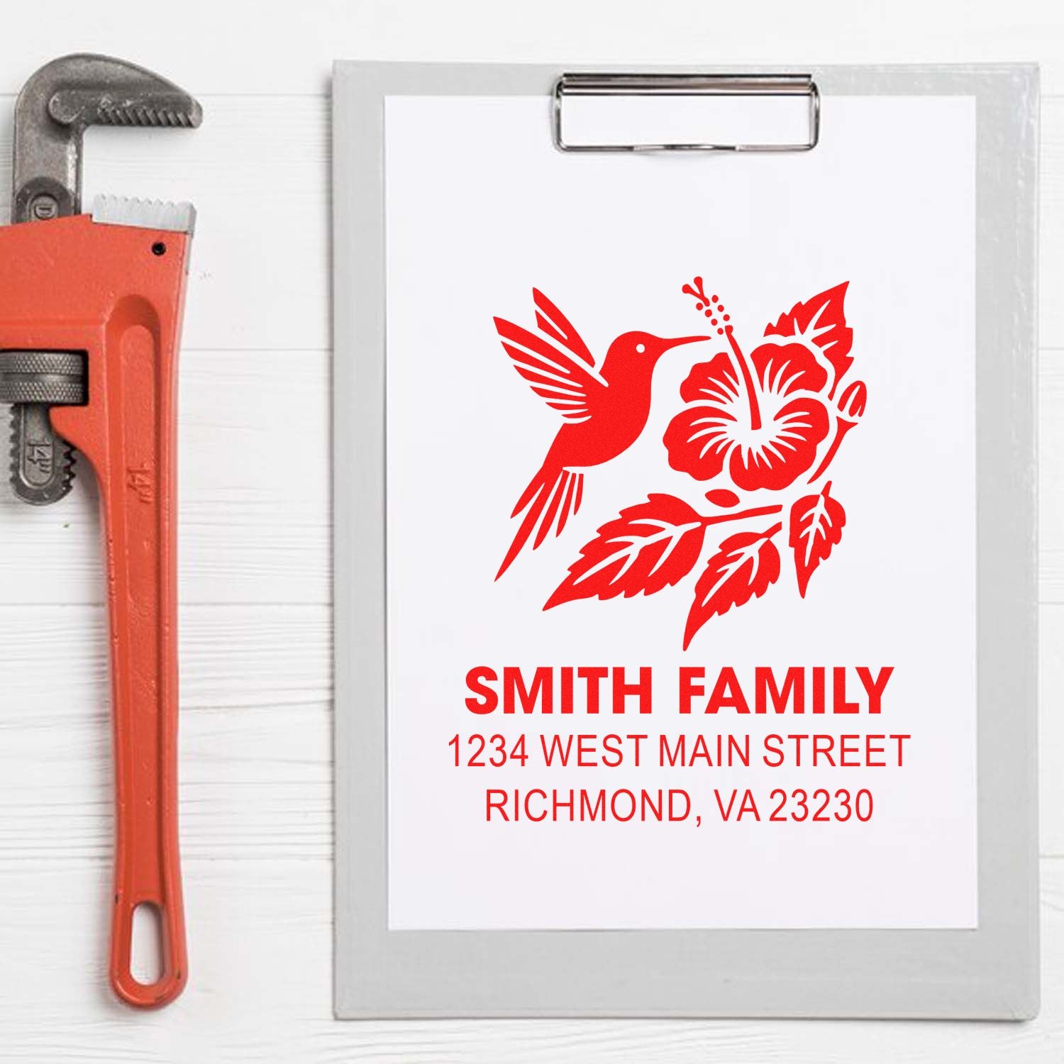 Custom family address rubber stamp with hummingbird and hibiscus design, personalized for mailing labels and stationery