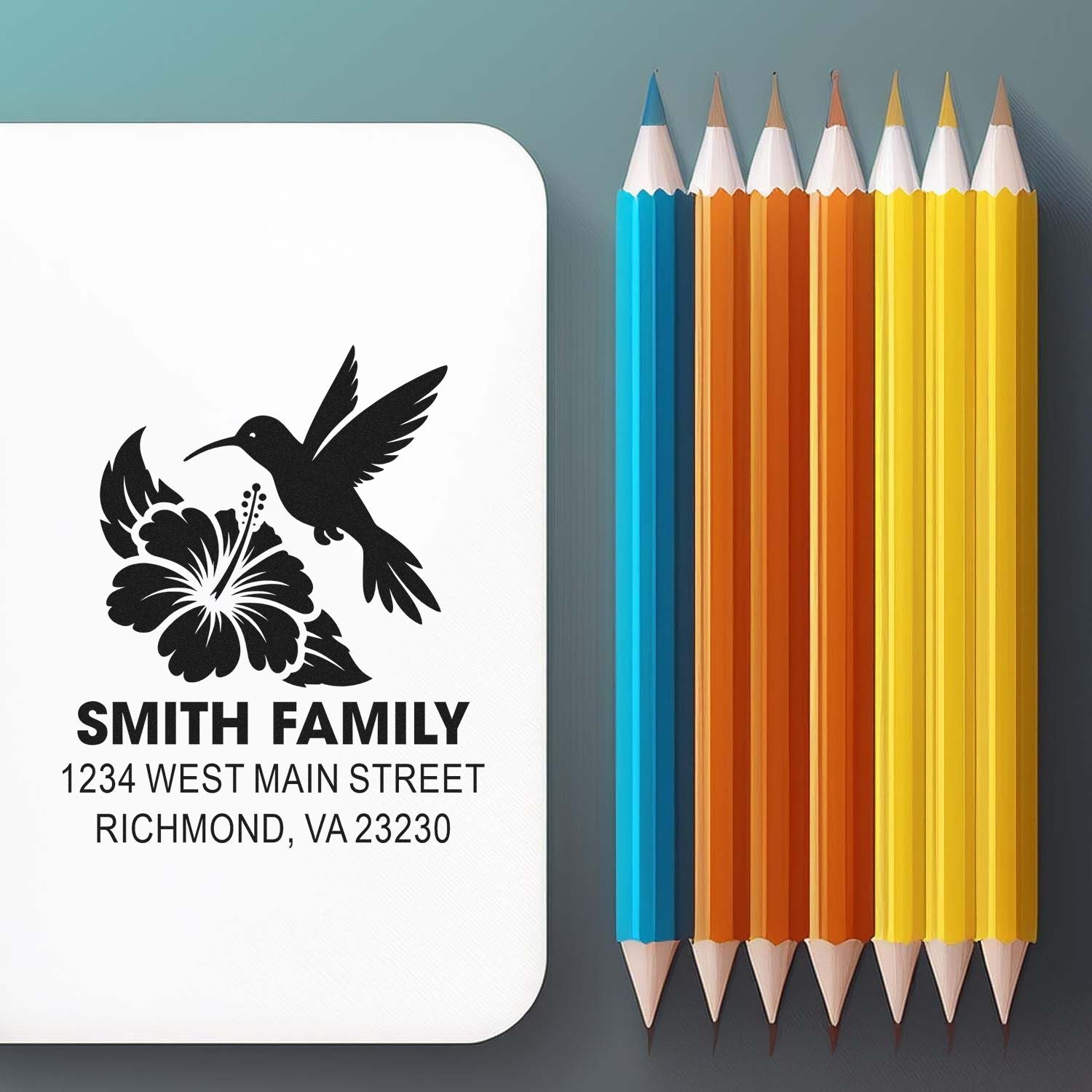Custom family address rubber stamp with hummingbird and hibiscus design, showing Smith family name and Richmond, VA address.