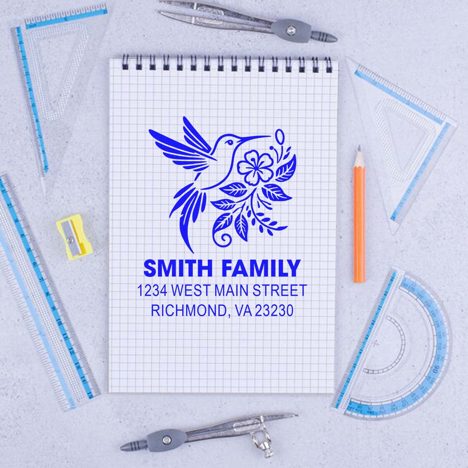 Personalized hummingbird floral return address rubber stamp with Smith Family name and Richmond, VA address.