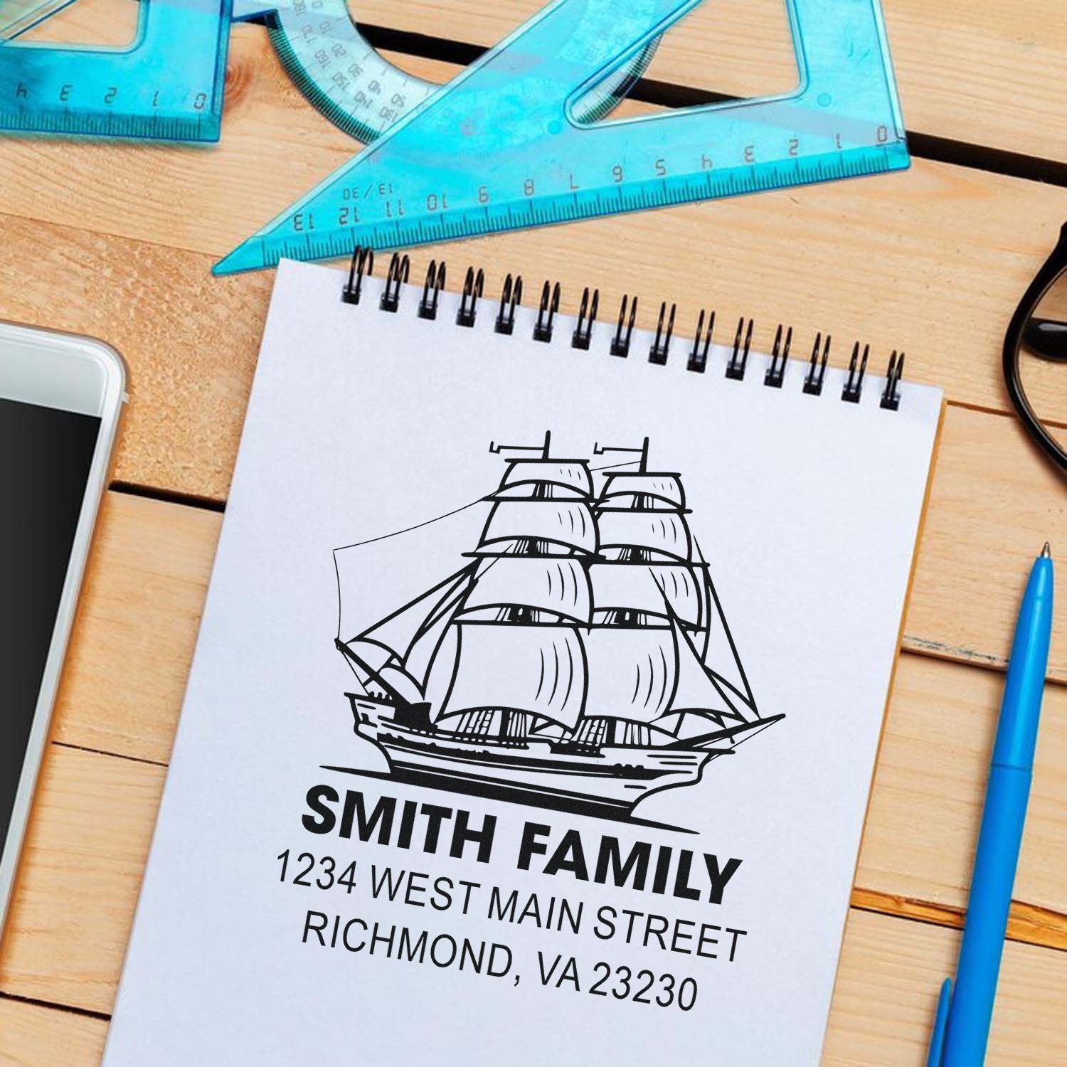 Custom family address rubber stamp with sailing ship design for personalized mail, wedding invites, and stationery.