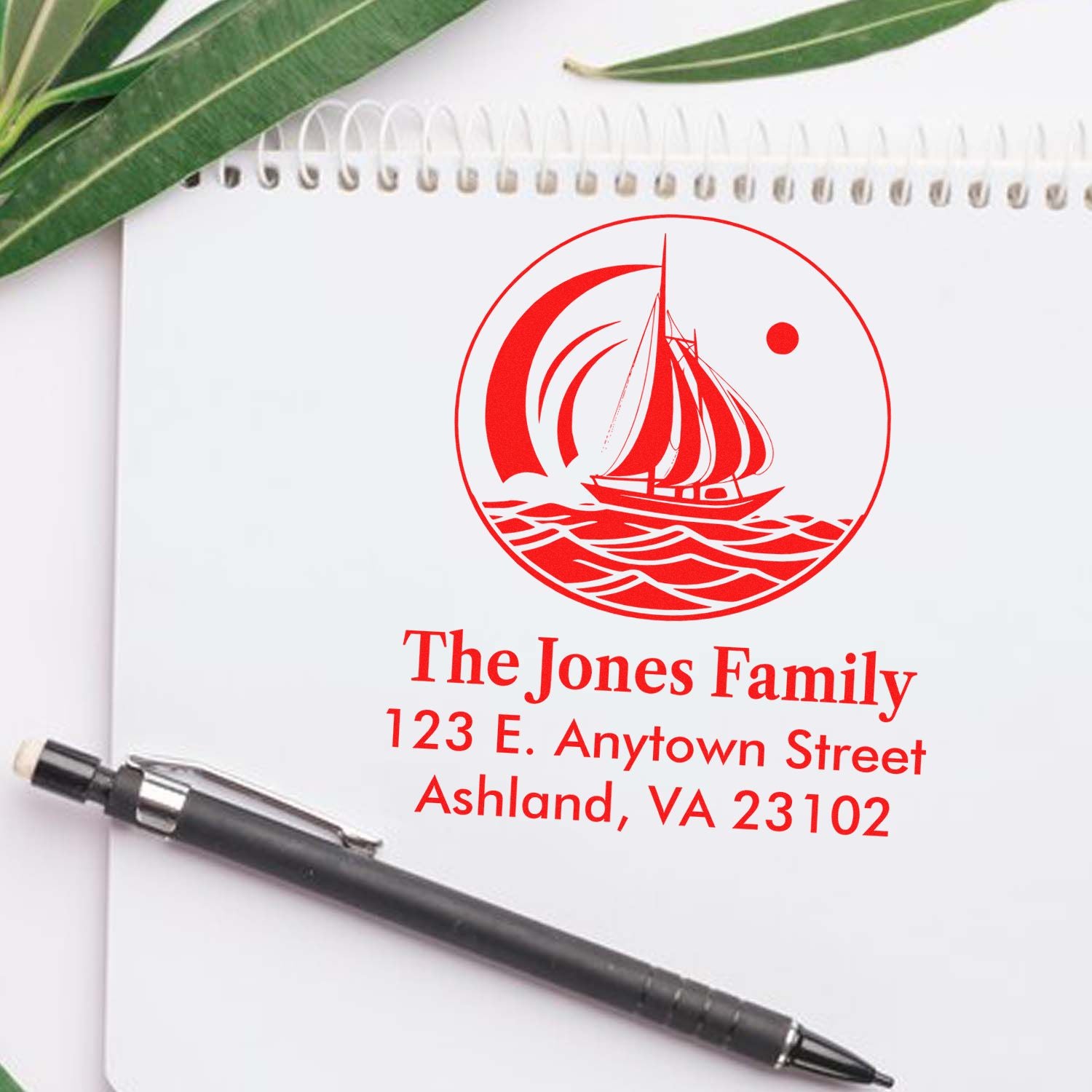 Personalized sailboat family address rubber stamp with The Jones Family mailing address.