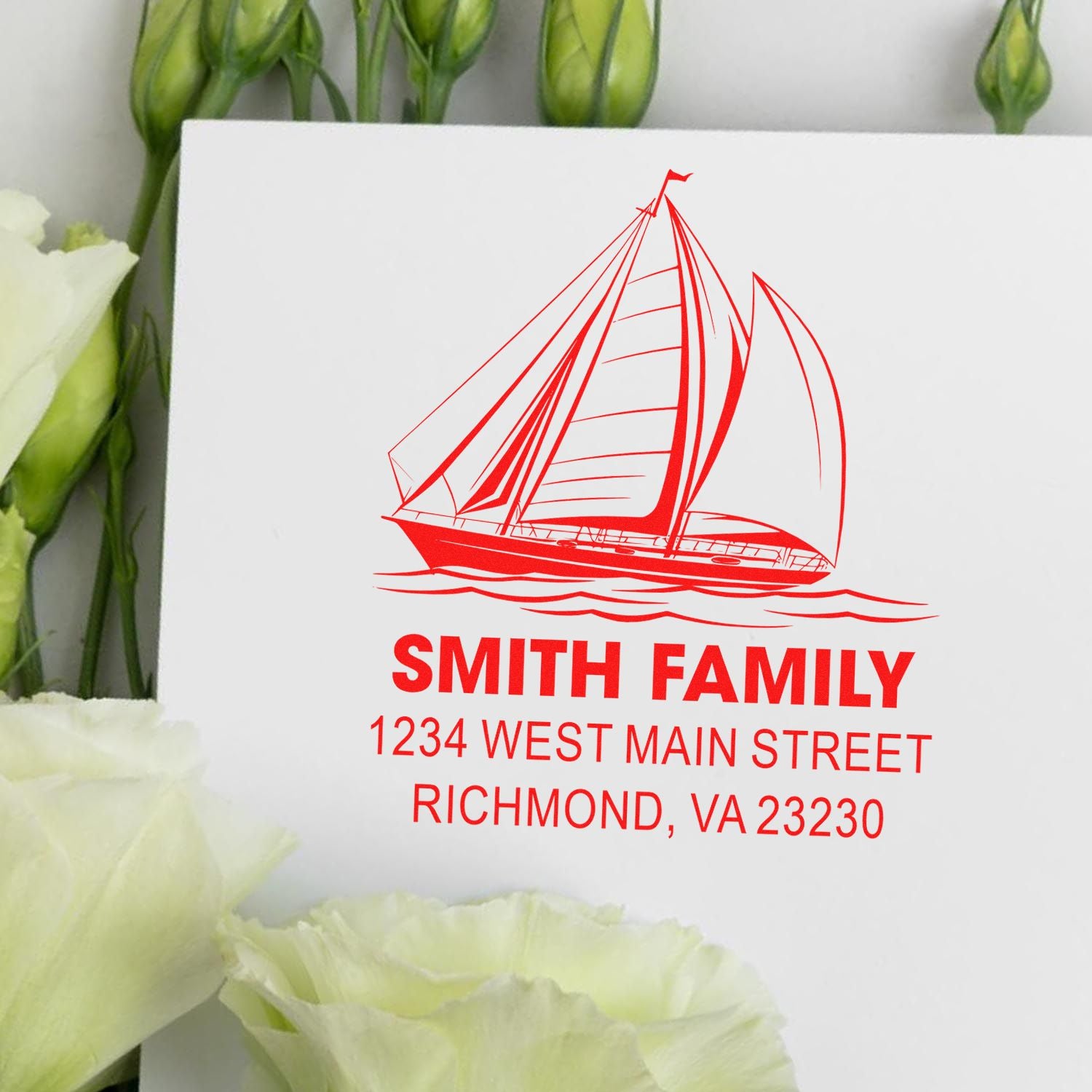 Personalized sailboat return address rubber stamp for family mailings, featuring custom name and address.