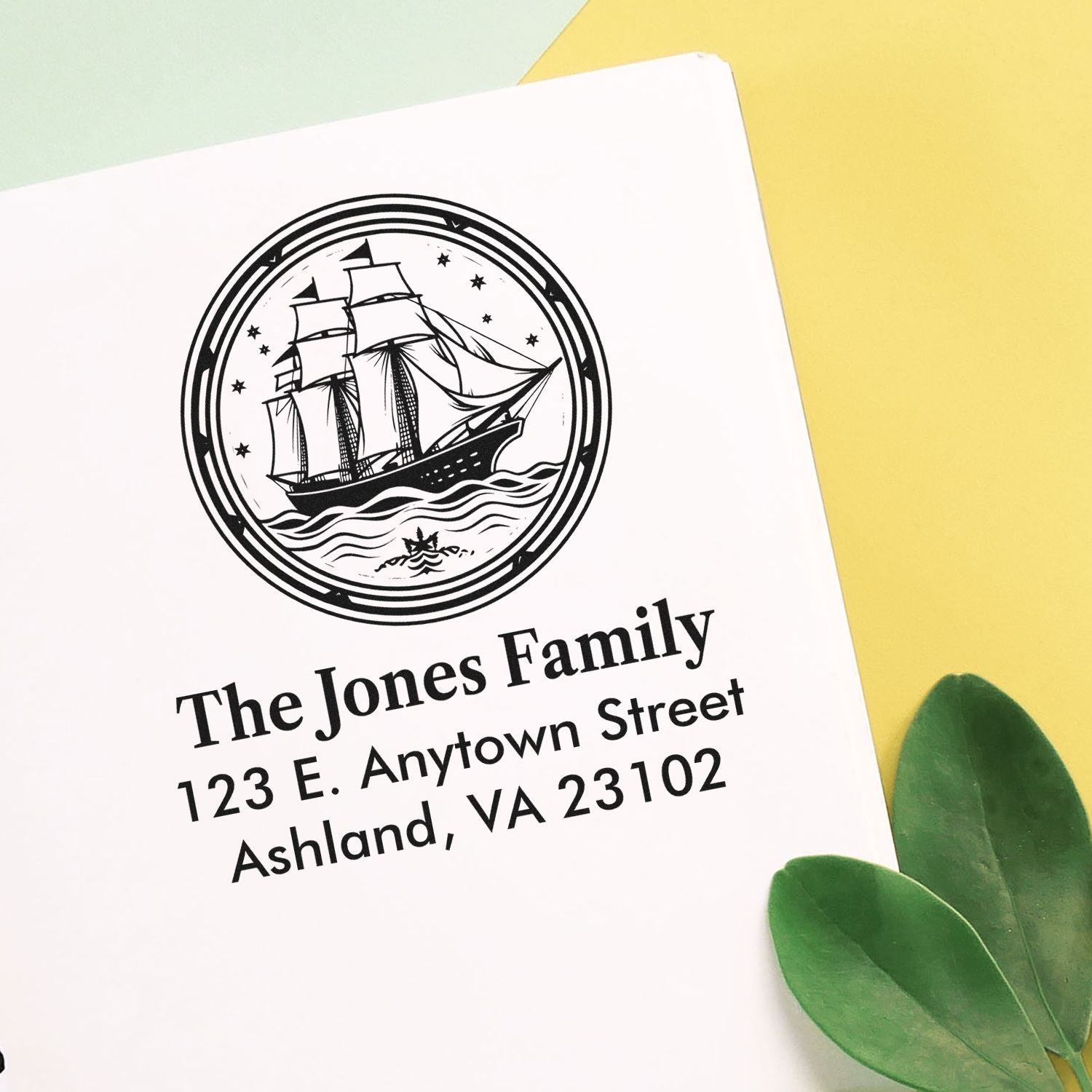 Custom family return address rubber stamp with sailing ship emblem, personalized mailing stamp for envelopes and stationery.