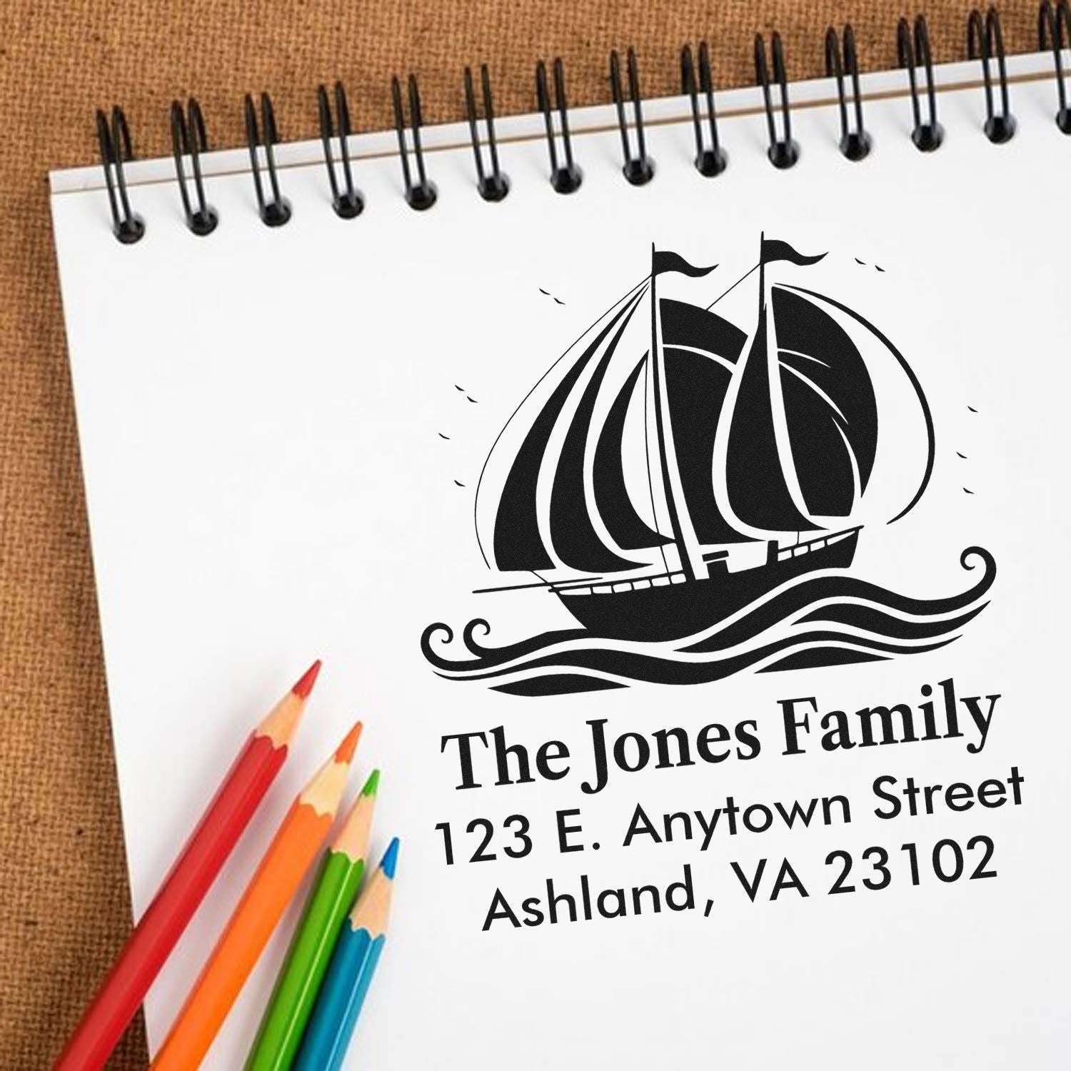 Custom sailboat return address rubber stamp for The Jones Family, Ashland, VA 23102.