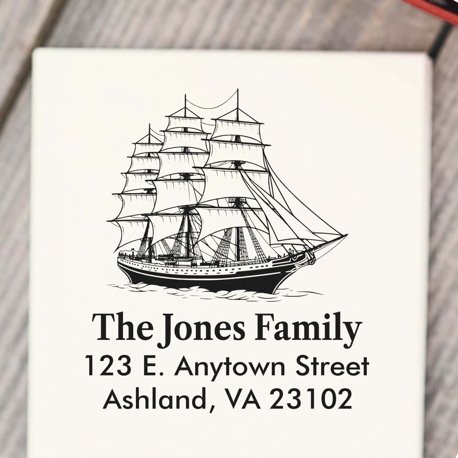 Custom rubber stamp with sailing ship and return address for The Jones Family, Ashland, VA personalized mail.