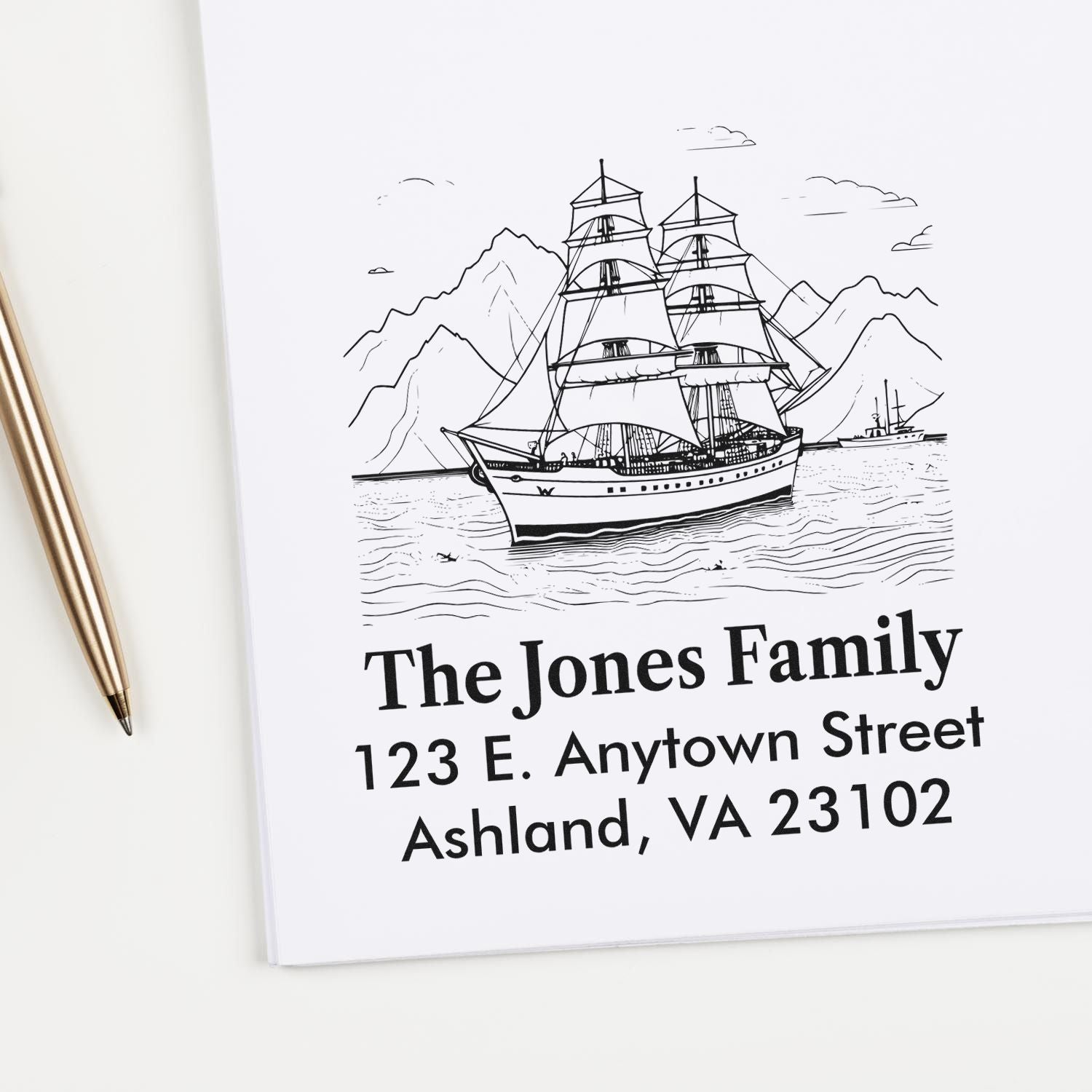 Custom nautical return address rubber stamp with sailing ship, mountains, and personalized family name and address.