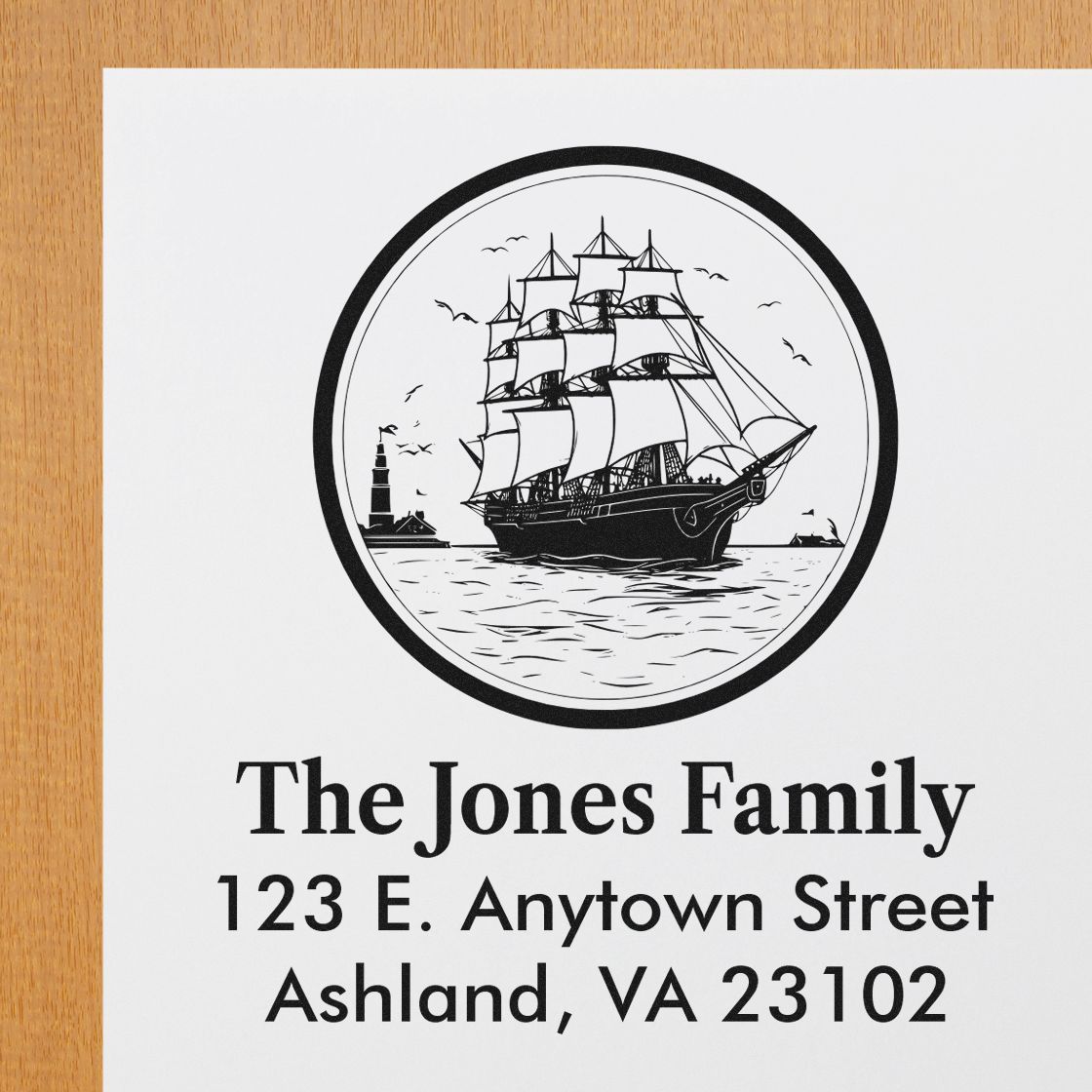 Custom nautical family return address rubber stamp with sailing ship and lighthouse design for The Jones Family.