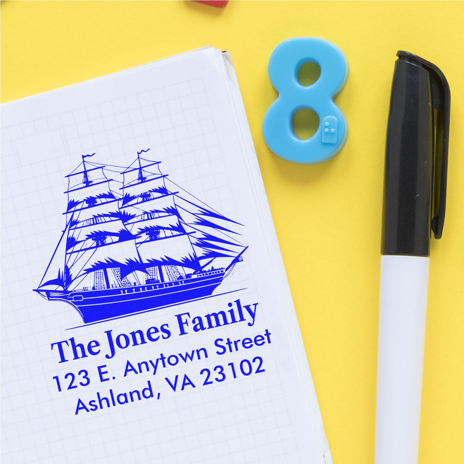 Custom return address rubber stamp with sailboat logo for The Jones Family, ideal for personalized stationery.