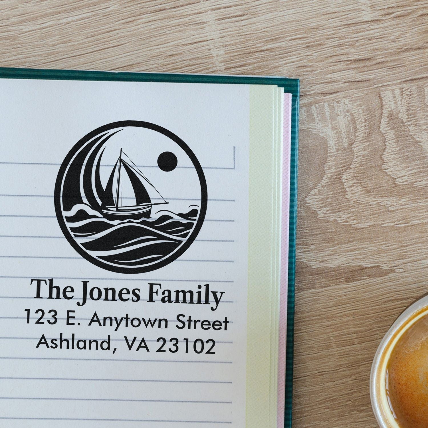 Custom rubber address stamp with sailboat logo, family name, and return address for envelopes, stationery, and mailings.