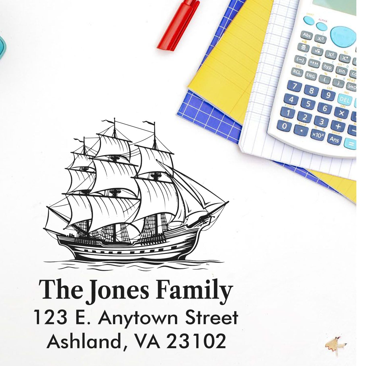 Personalized rubber stamp with sailing ship design and return address for The Jones Family, Ashland, VA 23102.
