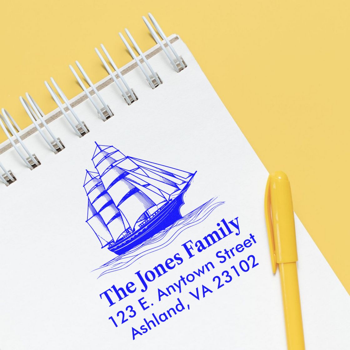 Custom nautical return address rubber stamp with sailboat design for The Jones Family, 123 E. Anytown Street, Ashland, VA 23102.