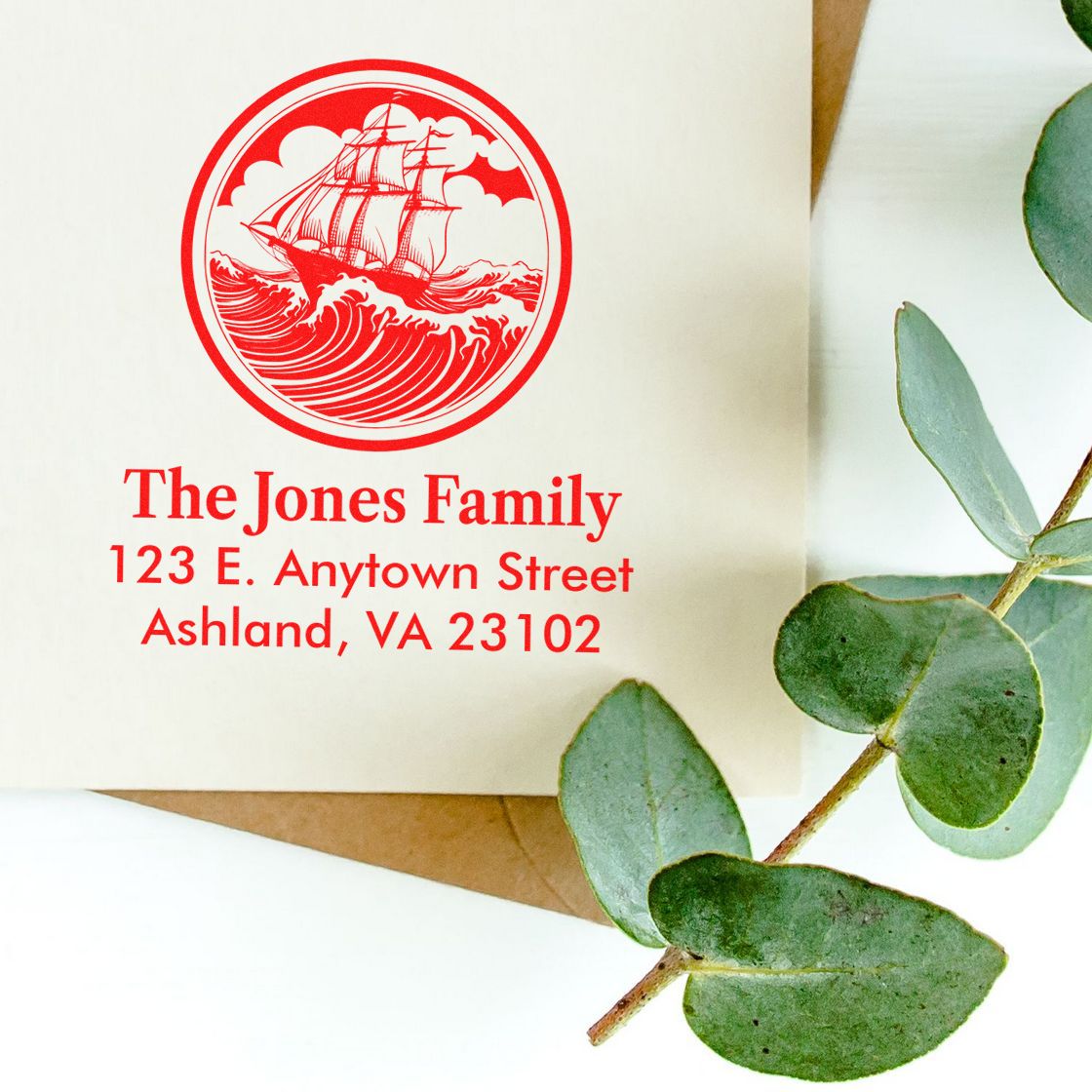 Custom sailboat return address rubber stamp for The Jones Family, personalized with name and address.