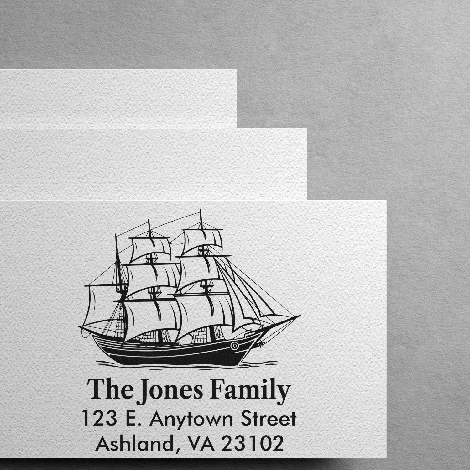 Custom nautical return address rubber stamp featuring a sailing ship, The Jones Family name, and address.