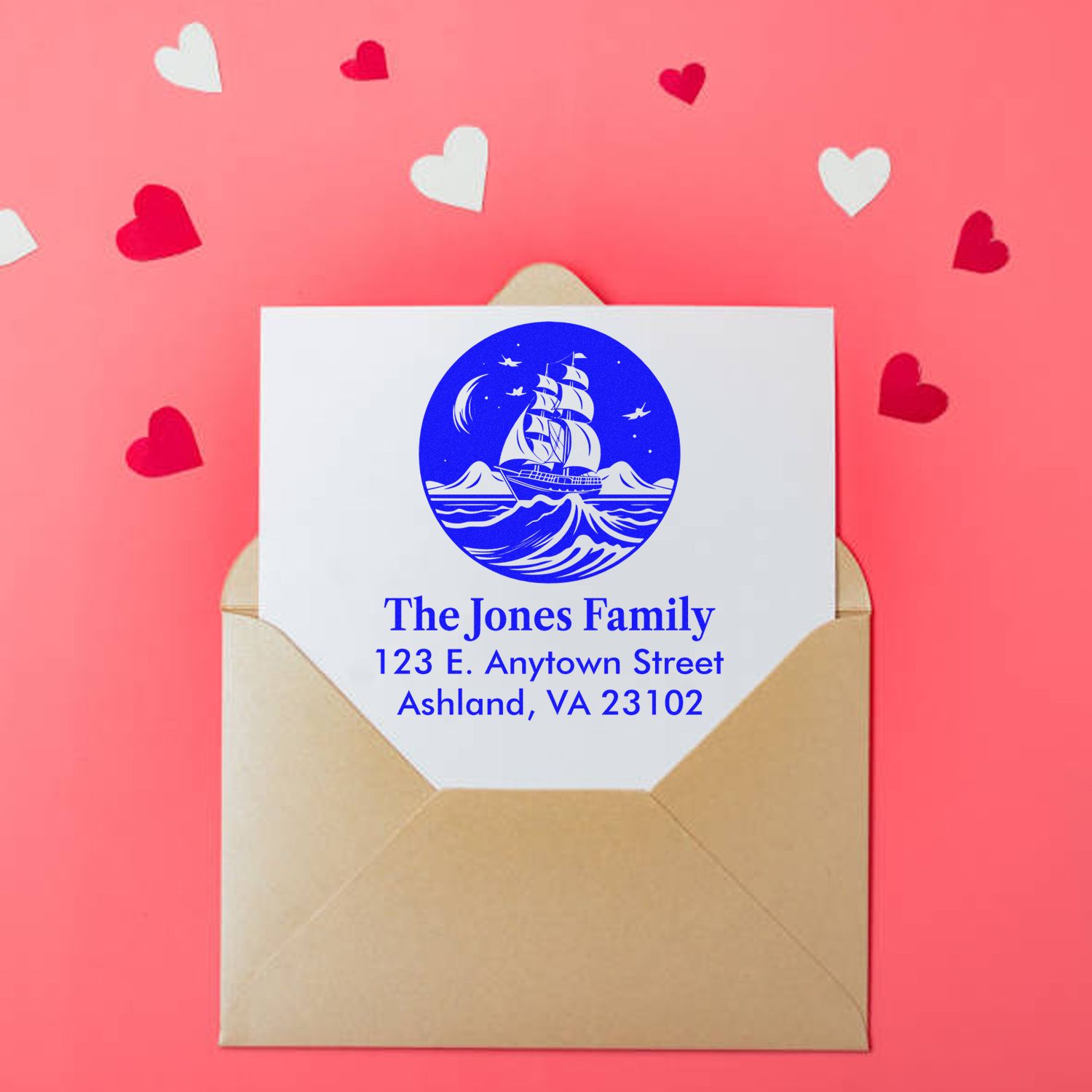 Custom return address rubber stamp with ship logo for The Jones Family, shown on an envelope for personalized mailing.