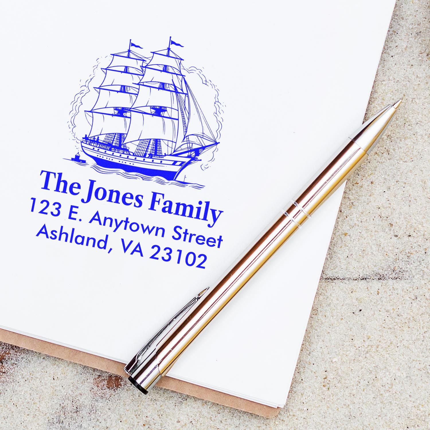 Custom sailboat return address rubber stamp for The Jones Family, featuring name and Ashland, VA address.