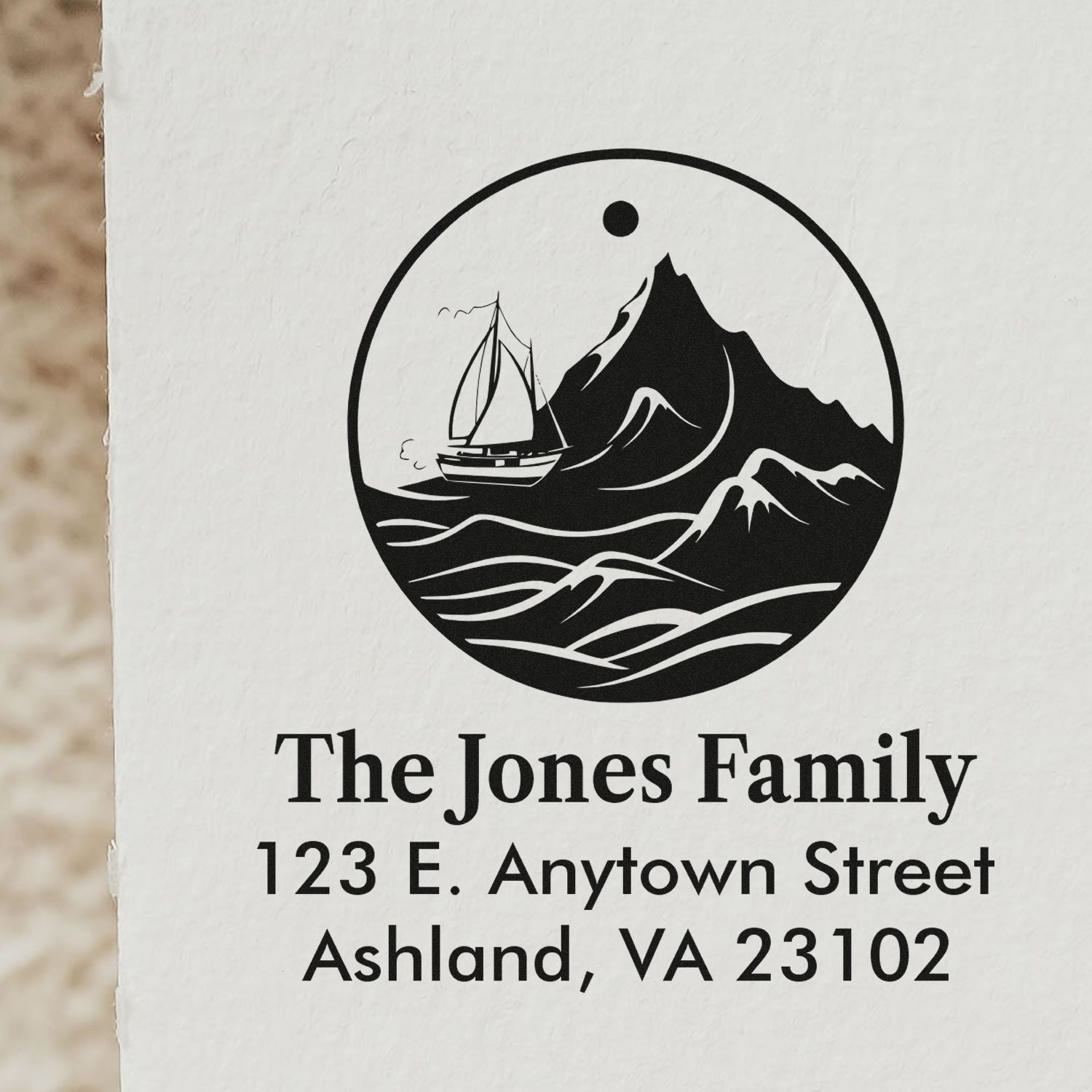 Personalized return address rubber stamp with sailboat and mountain logo for The Jones Family, Ashland, VA 23102.