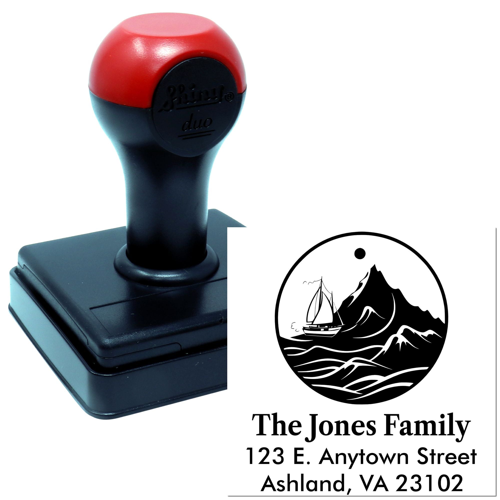 Custom address rubber stamp with family name and mountain logo for personalized mailing and return addresses.