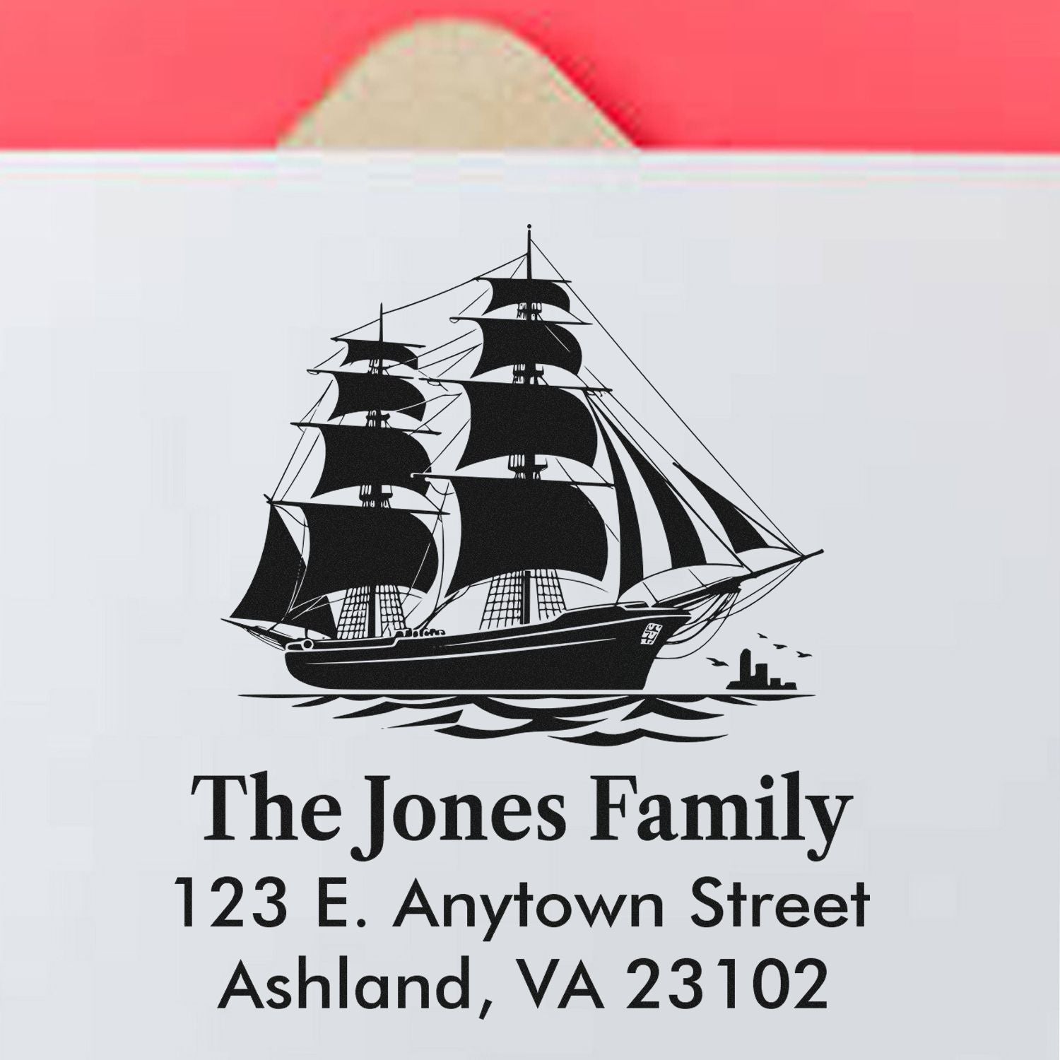 Custom family return address rubber stamp with sailing ship design for The Jones Family, Ashland, VA 23102.