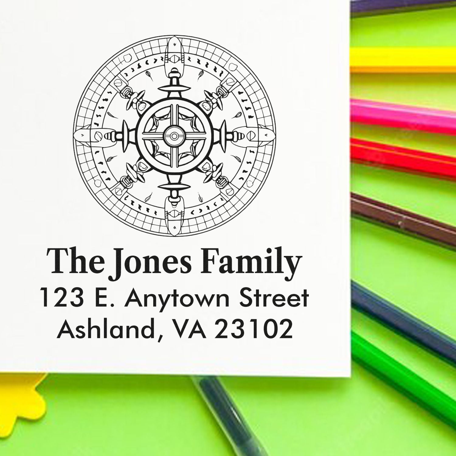 Custom family address rubber stamp with compass design for The Jones Family, 123 E. Anytown Street, Ashland, VA 23102.