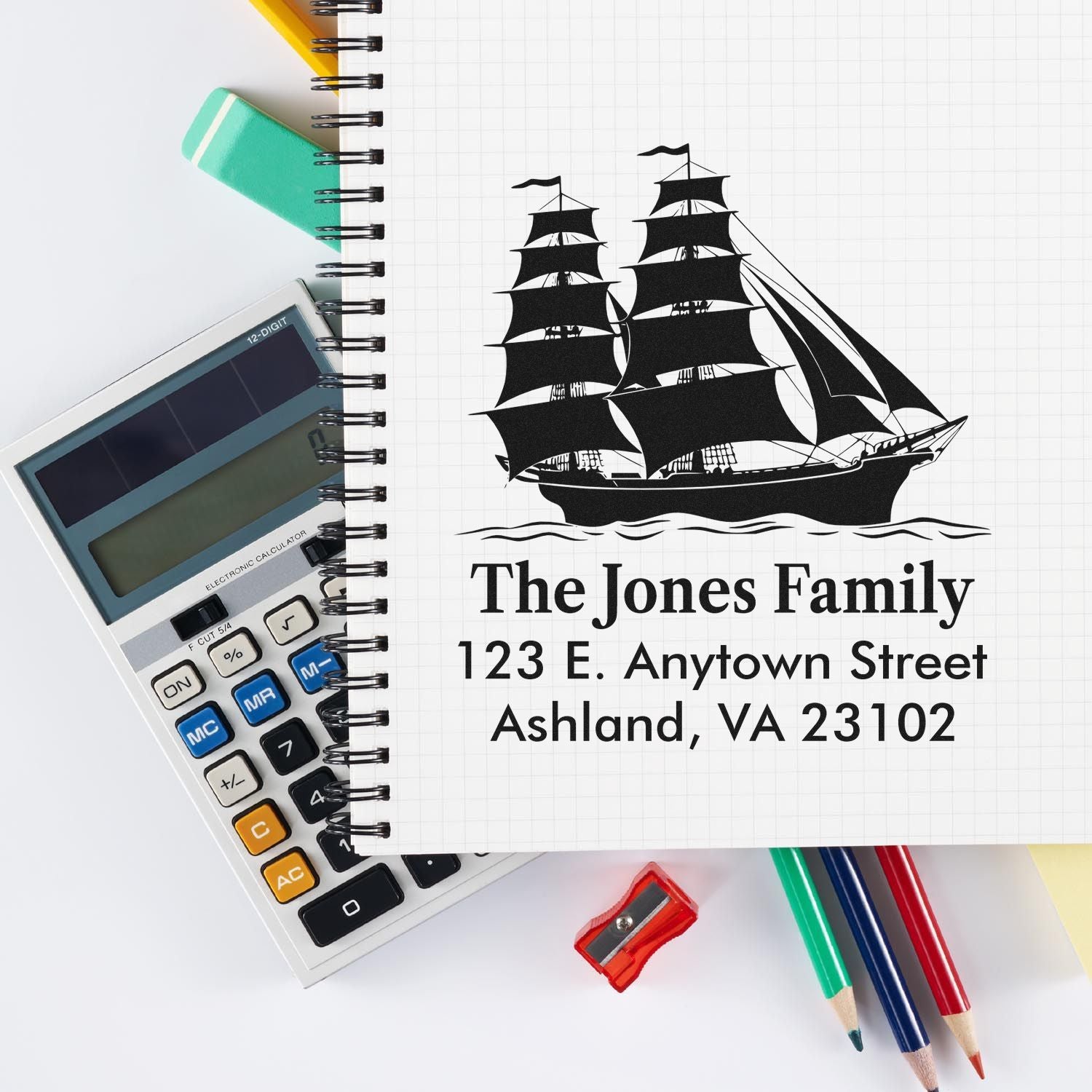Custom family address rubber stamp with sailing ship design for The Jones Family, 123 E. Anytown Street, Ashland, VA.