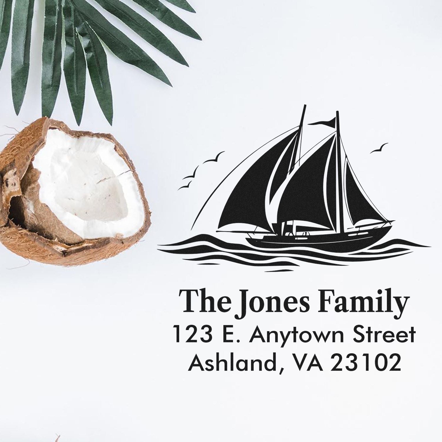 Custom address rubber stamp with sailboat logo for family return mail, stationery, and nautical-themed invitations.
