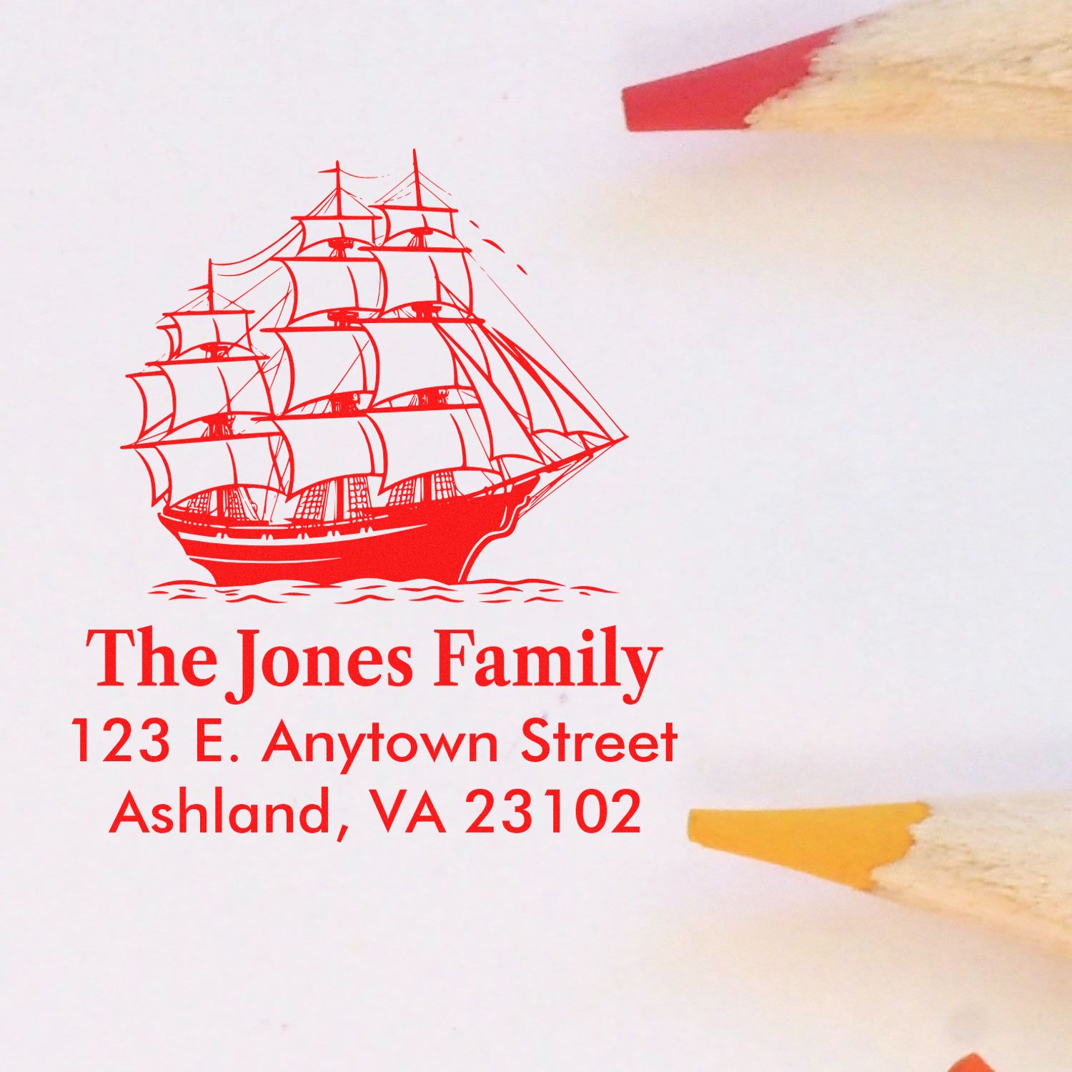 Custom rubber address stamp with sailboat design and return address for The Jones Family, Ashland, VA 23102.