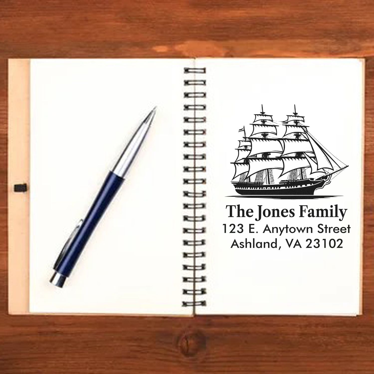 Custom sailing ship family address rubber stamp with name and street address for envelopes, stationery, and mailings.