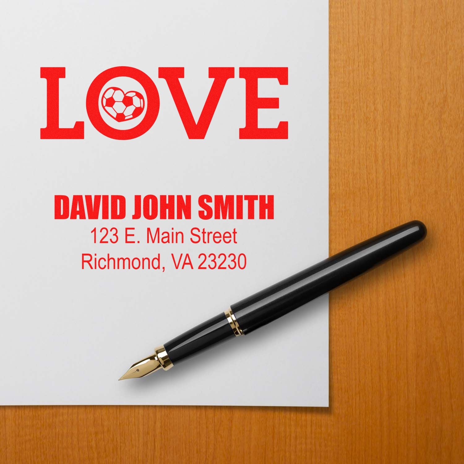 Personalized address rubber stamp mockup with soccer-themed LOVE design, name, and Richmond, VA address.