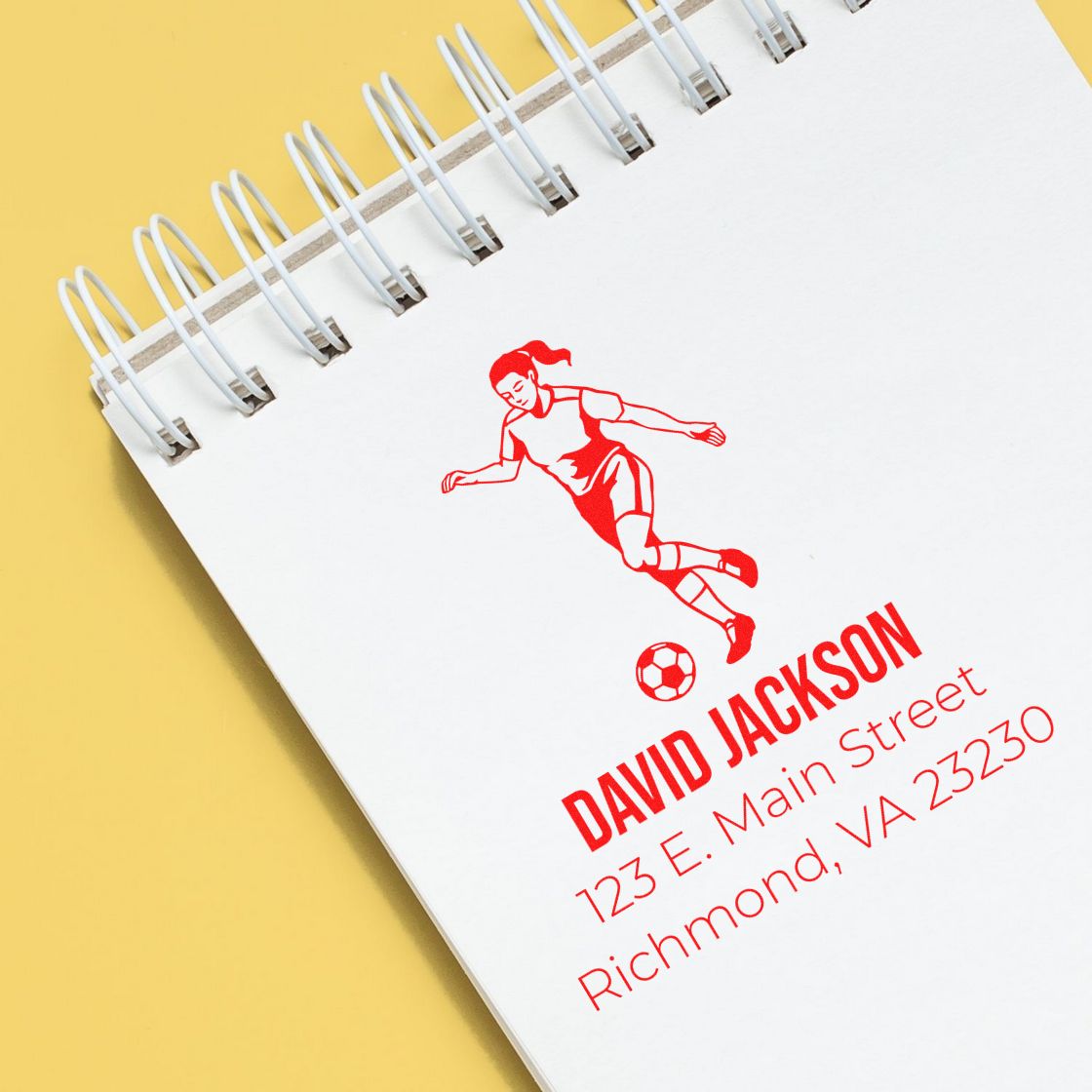 Custom soccer return address rubber stamp with player icon, name, and Richmond, VA address on notebook