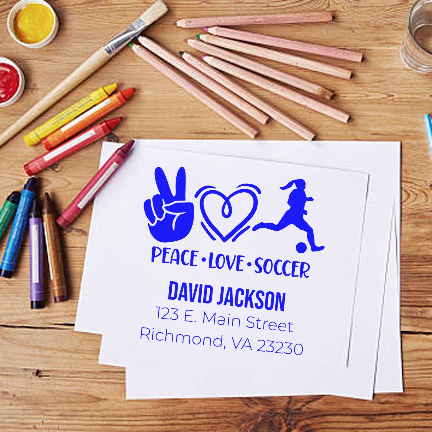 Custom peace love soccer rubber stamp design with name and address for personalized stationery and crafts.
