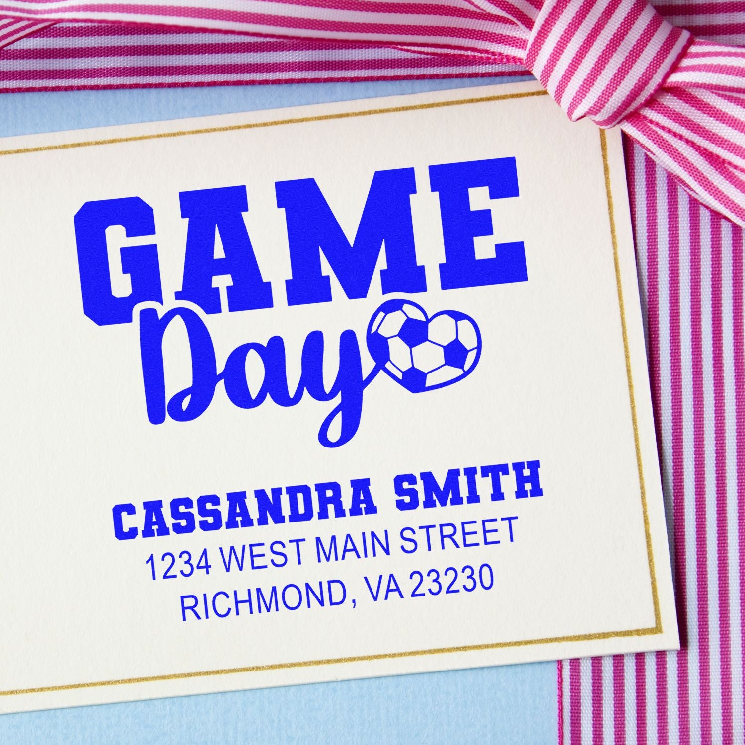 Custom Game Day rubber stamp with soccer ball design and personalized name and address for sports party invitations.