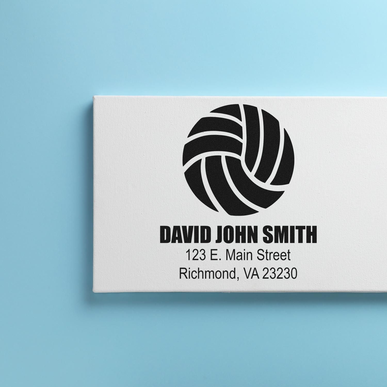 Custom address rubber stamp with volleyball logo for David John Smith, Richmond, VA.