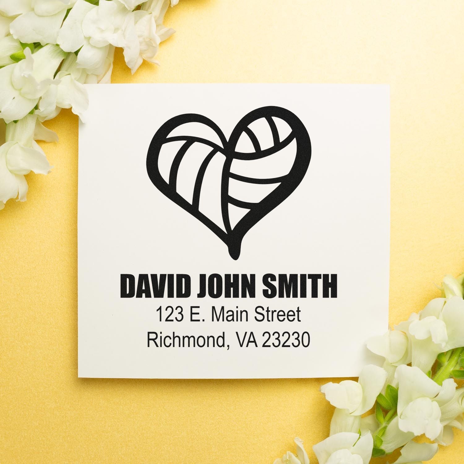 Custom rubber stamp with heart logo and return address for David John Smith in Richmond, VA.