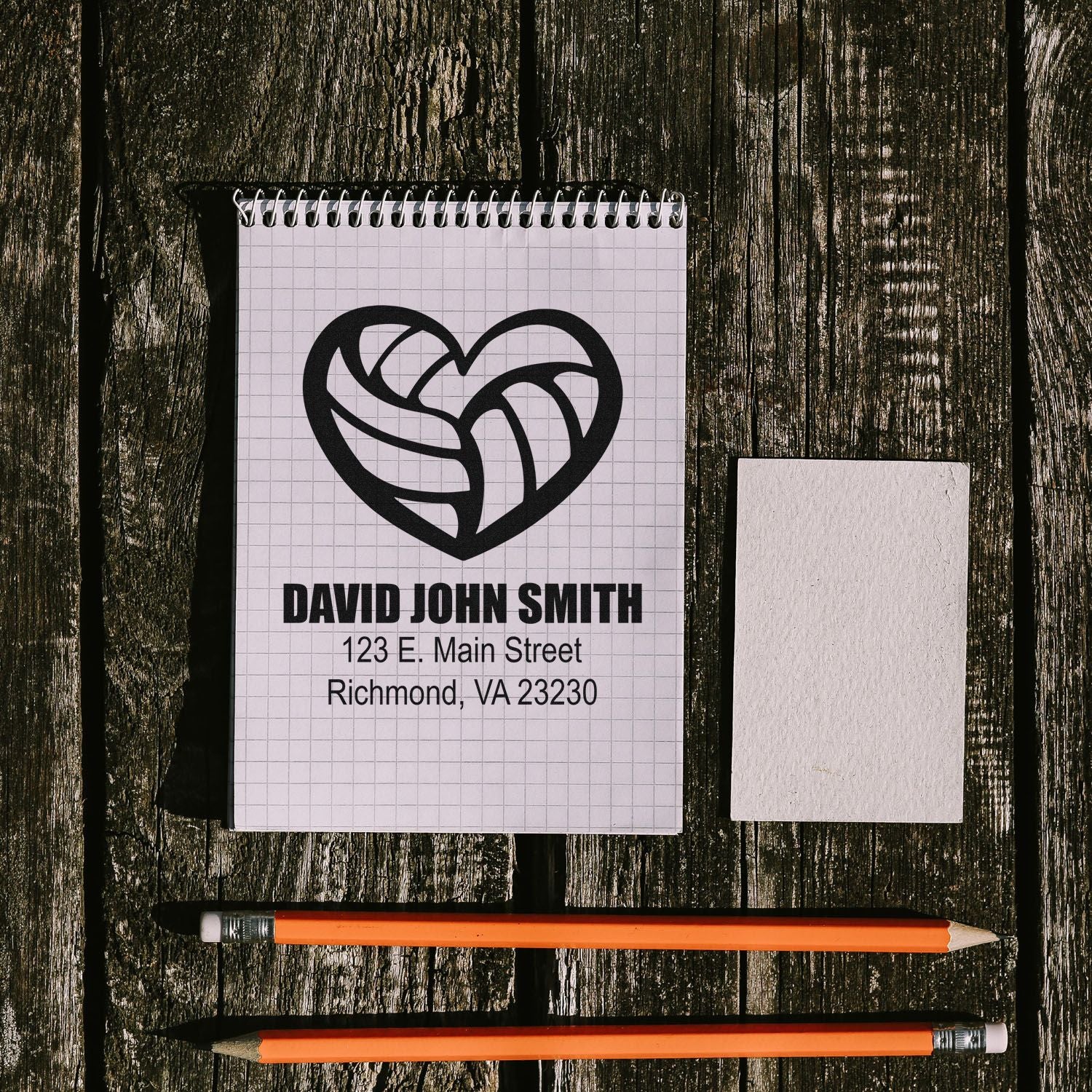 Custom rubber stamp design with logo and return address for David John Smith, Richmond, VA.