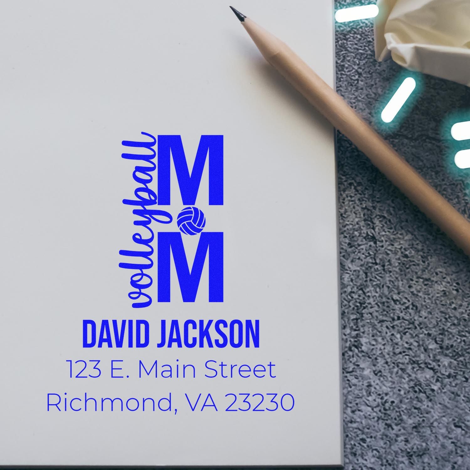 Custom address stamp design with monogram M, volleyball icon, and David Jackson name and Richmond, VA return address.