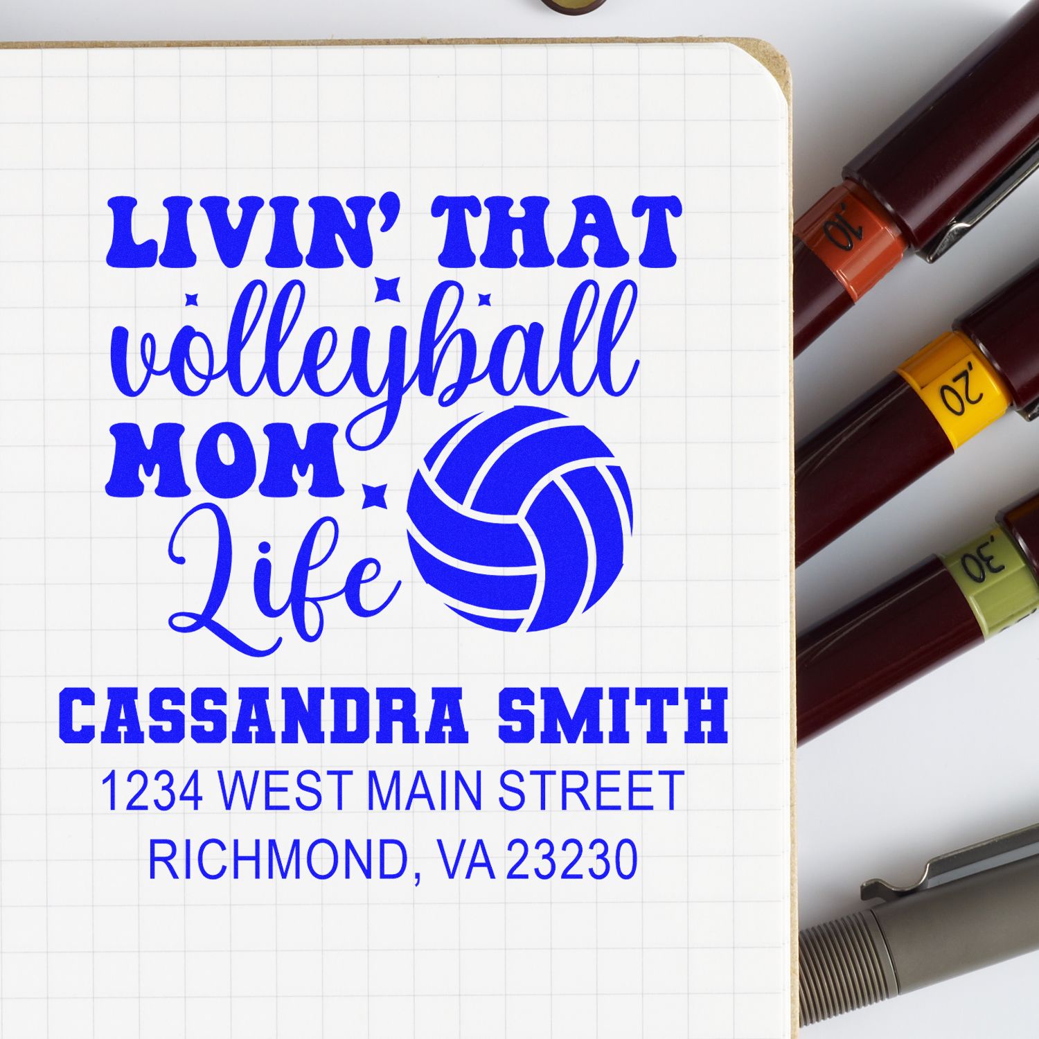 Personalized volleyball mom rubber stamp mockup with custom name and address, featuring Livin That Volleyball Mom Life and volleyball icon.