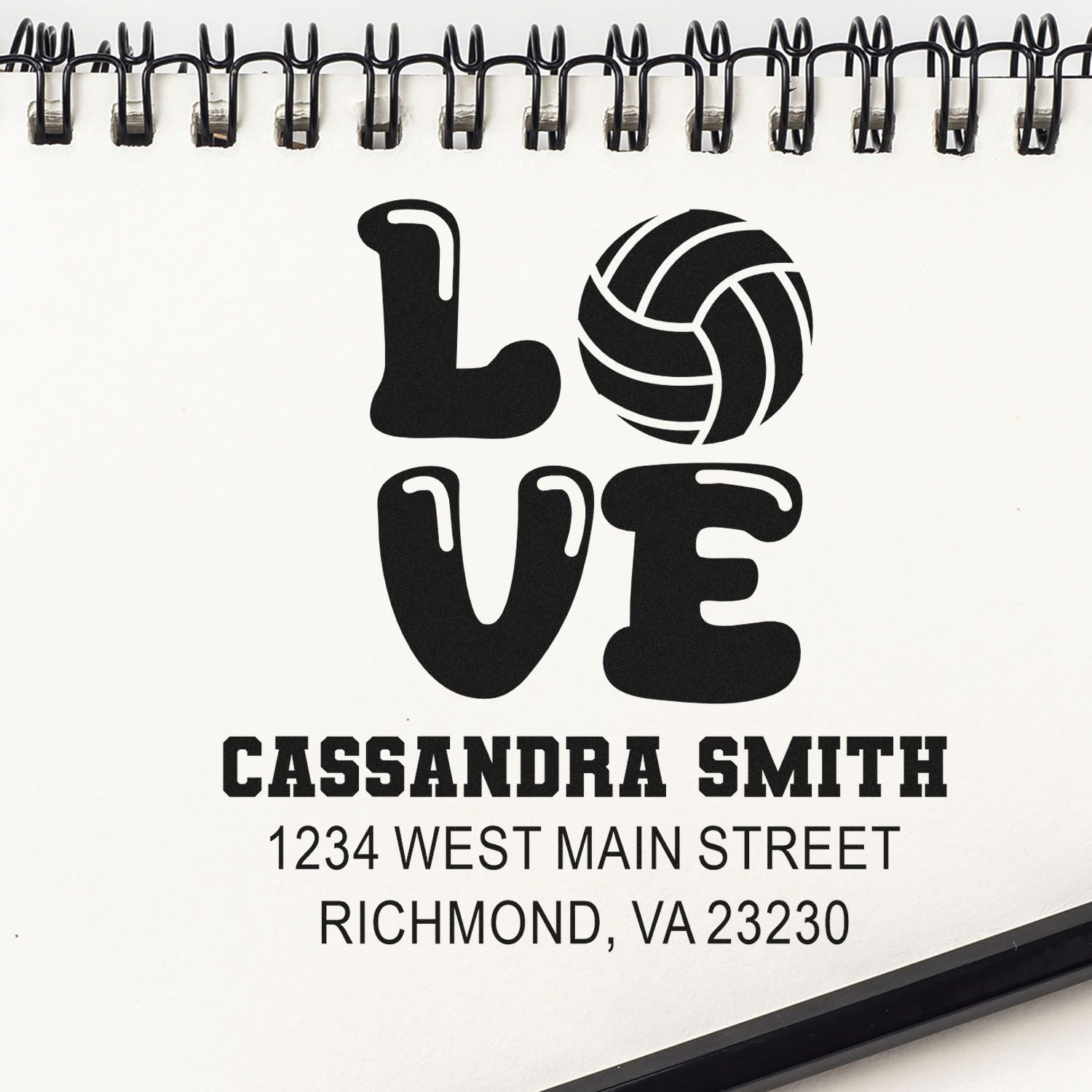 Custom rubber stamp design with LOVE volleyball graphic, Cassandra Smith name, and Richmond, VA address for personalized use.