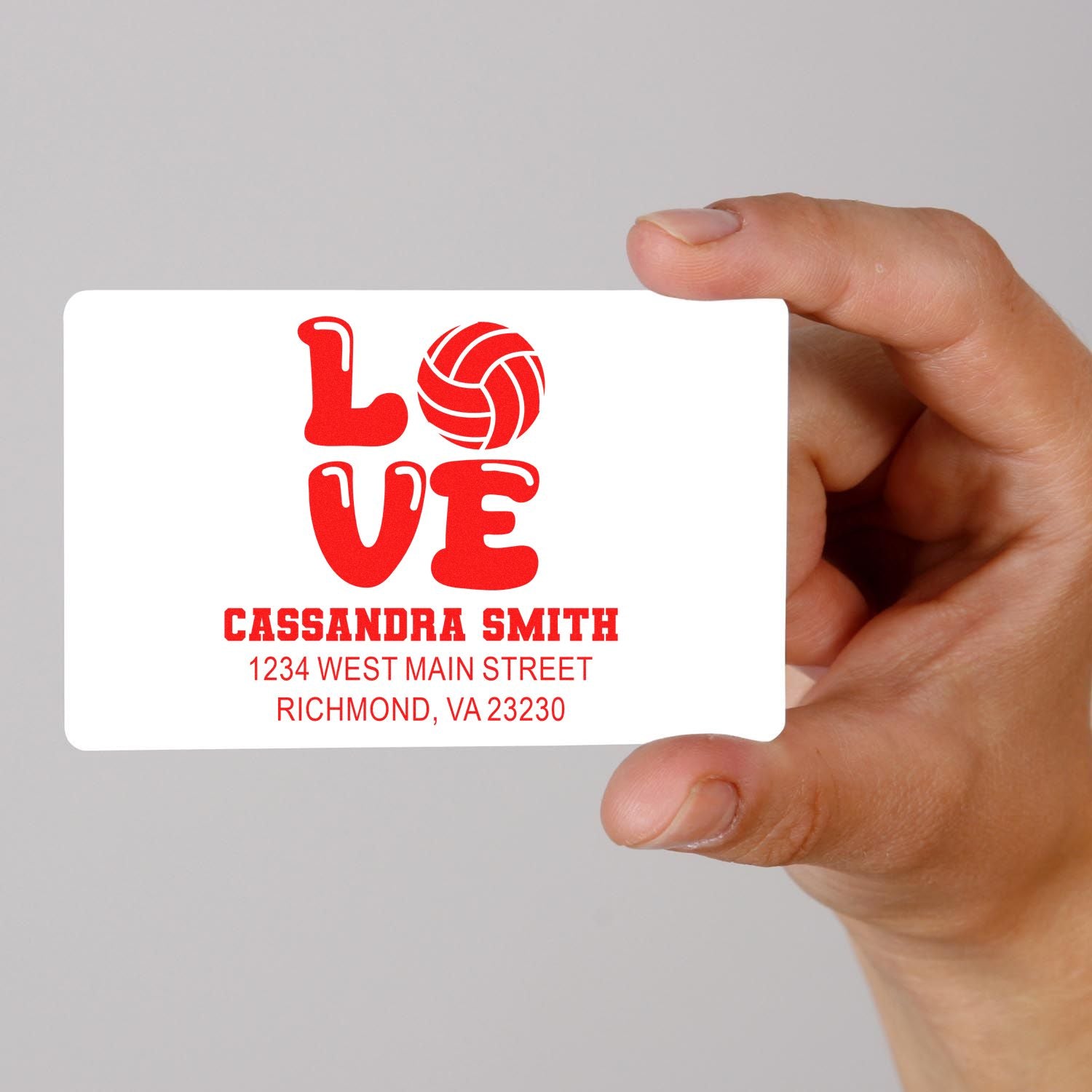 Custom rubber stamp design featuring LOVE volleyball art, Cassandra Smith name, and Richmond VA address.