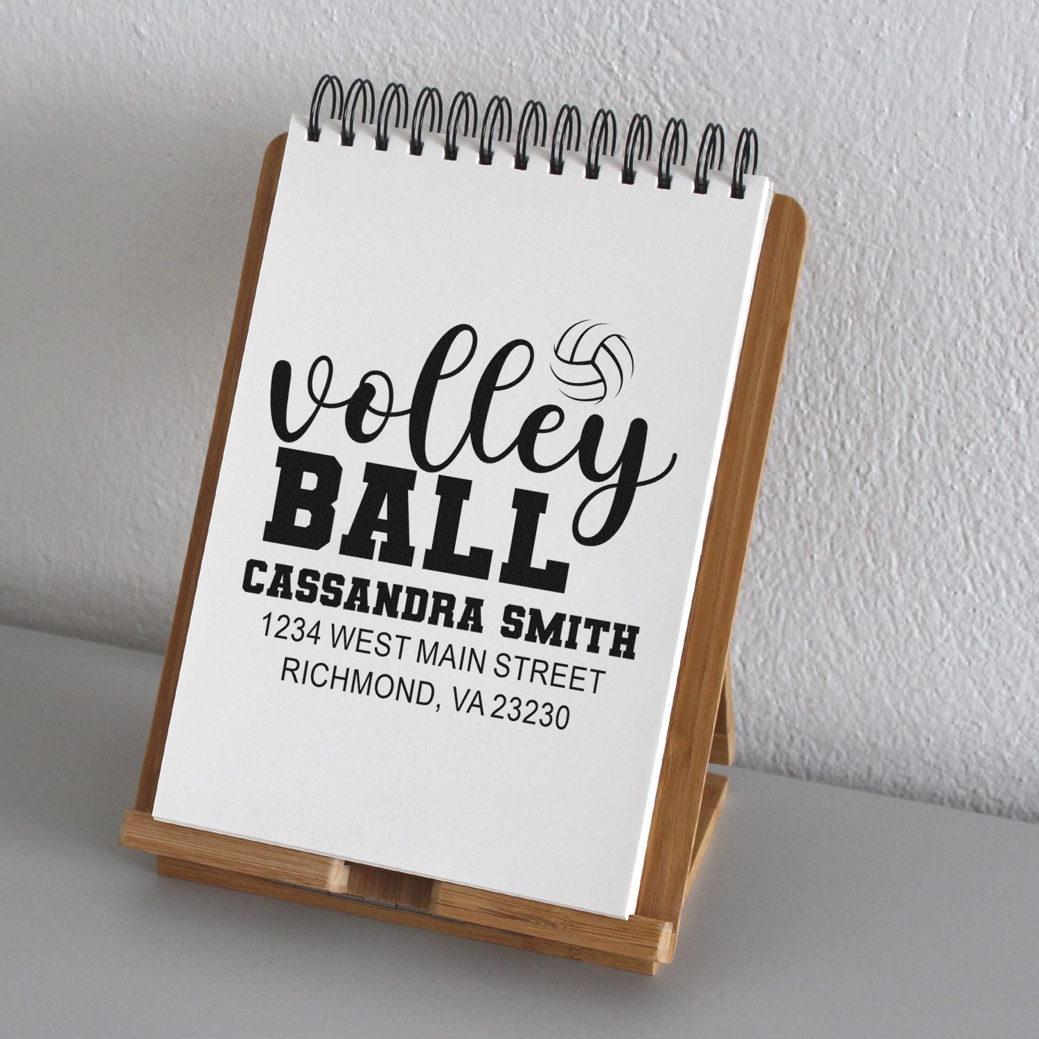 Custom volleyball rubber stamp design with personalized name and address for sports team stationery and mailings