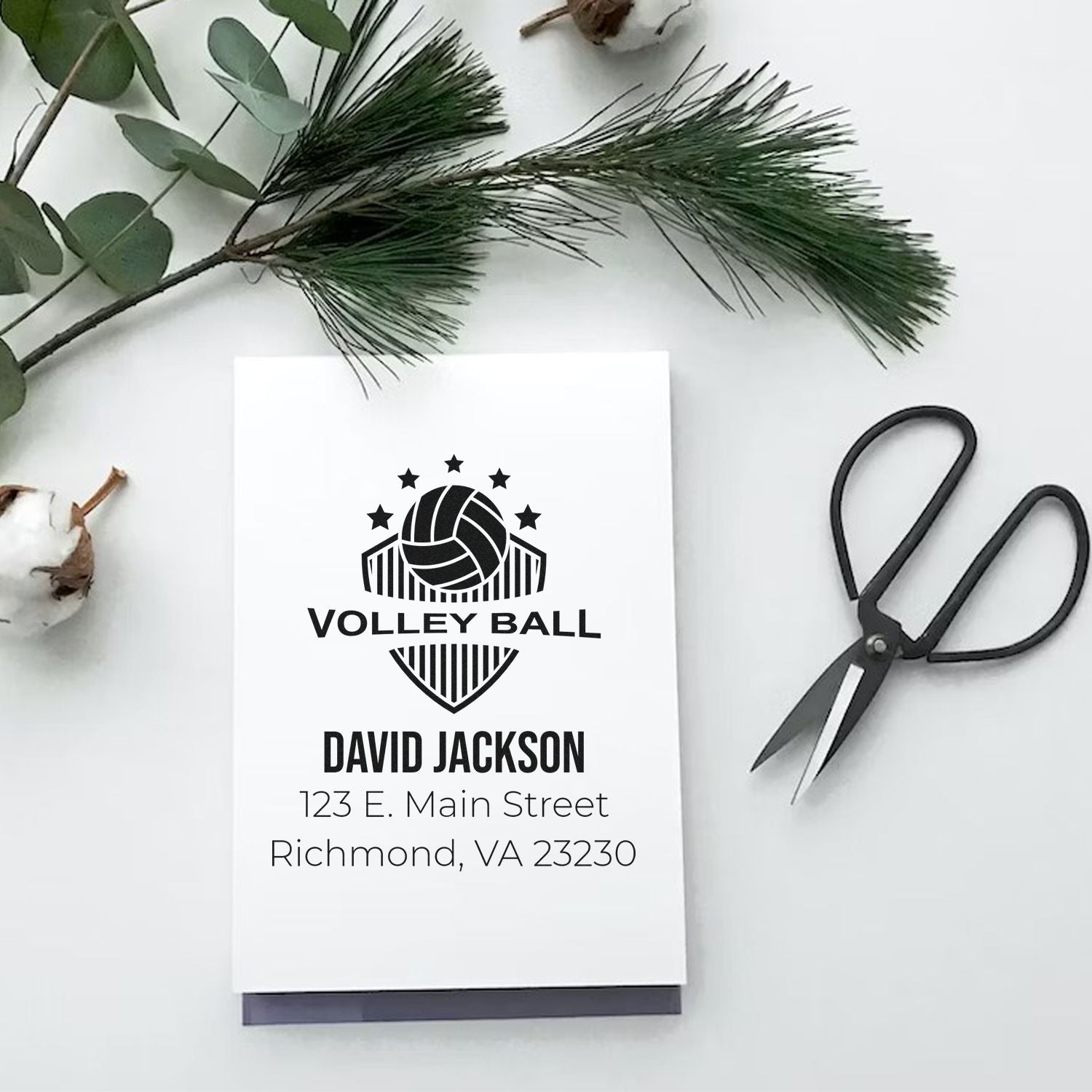 Personalized volleyball rubber stamp design with name and address for custom return address stationery.