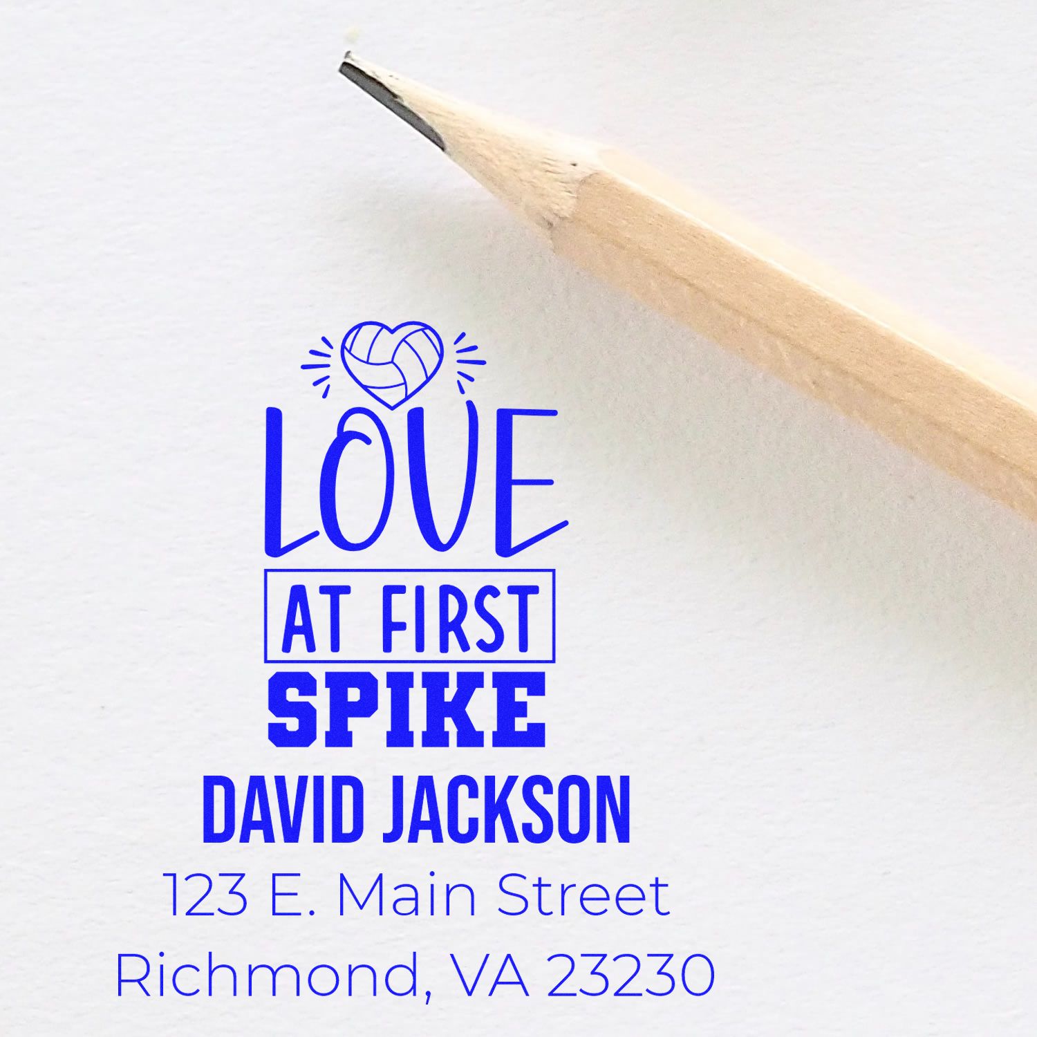 Personalized rubber stamp design with Love at First Spike, name, and address for volleyball wedding invitations.