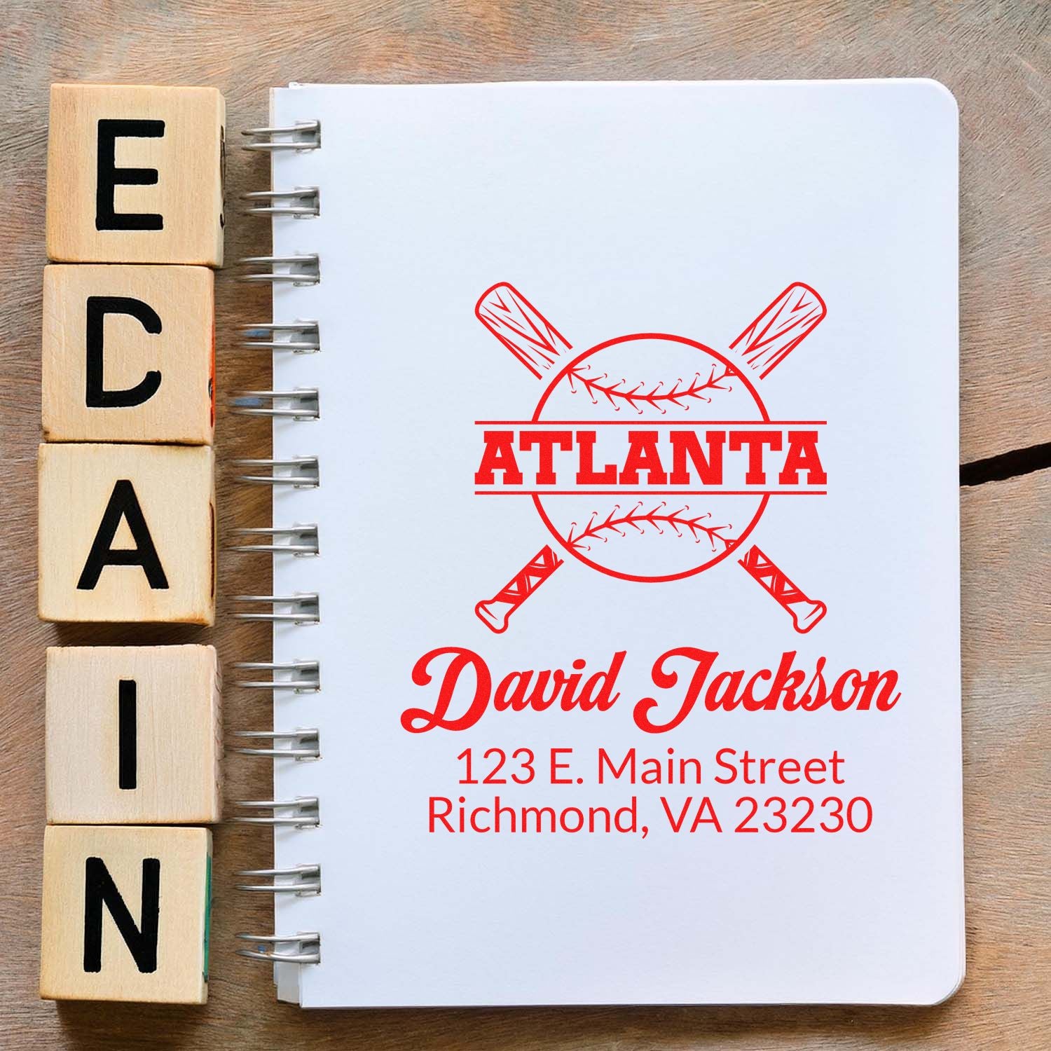 Custom baseball rubber stamp mockup with Atlanta logo, David Jackson name, and address for personalized stationery.